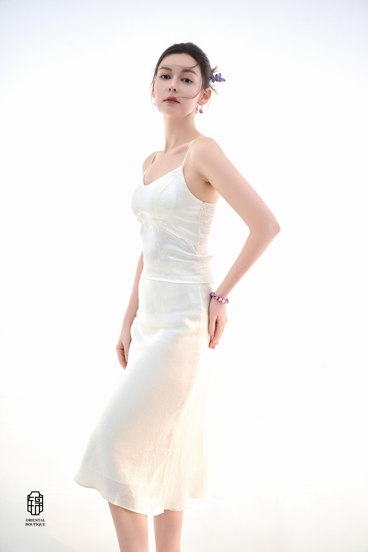 Midnight Silk Camisole,This lightweight camisole comes in classic black and elegant white, blending simplicity with a hint of allure. Crafted from airy silk fabric, it fits comfortably against the skin, beautifully highlighting the natural curves. The min