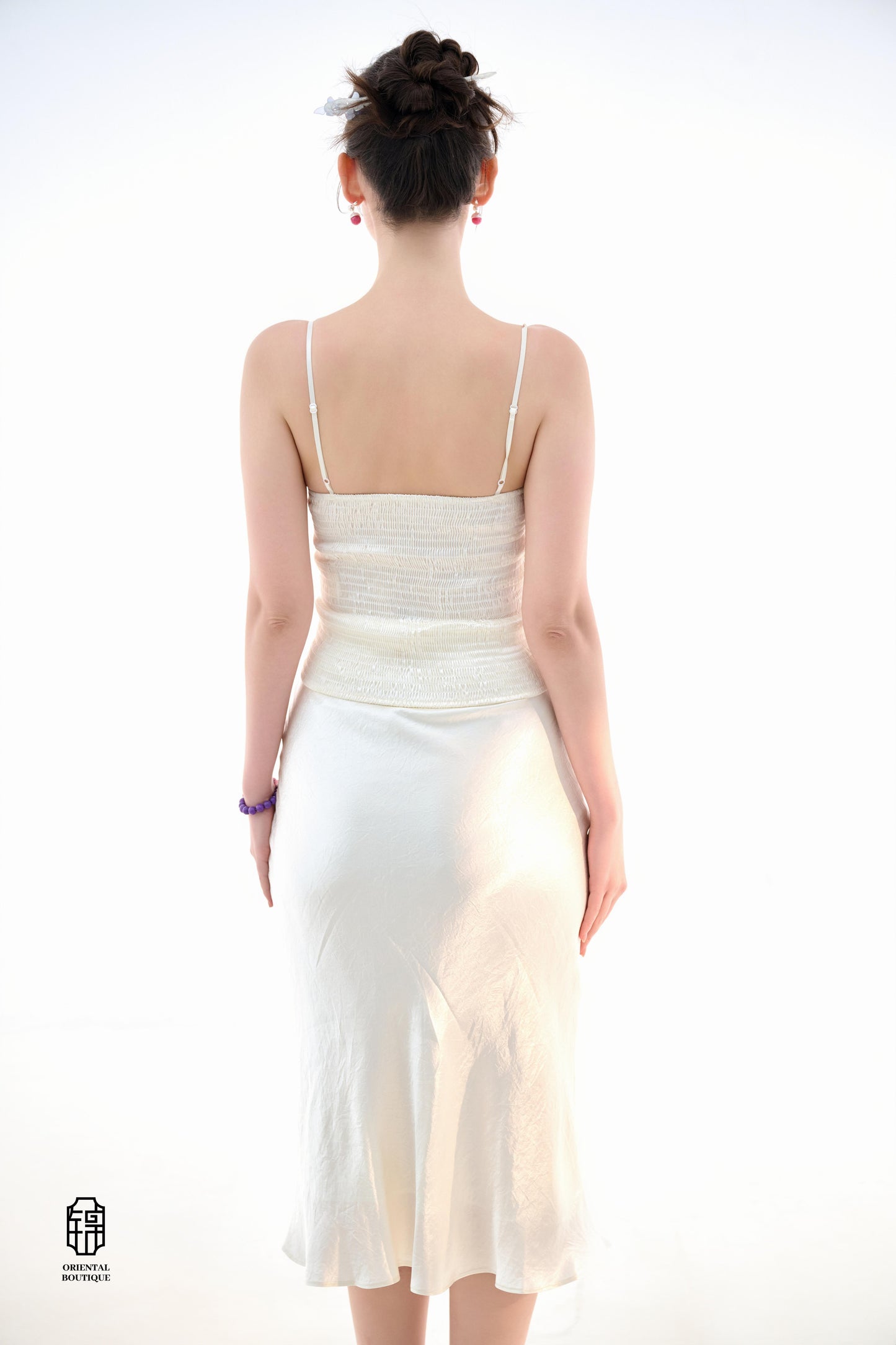 Midnight Silk Camisole,This lightweight camisole comes in classic black and elegant white, blending simplicity with a hint of allure. Crafted from airy silk fabric, it fits comfortably against the skin, beautifully highlighting the natural curves. The min