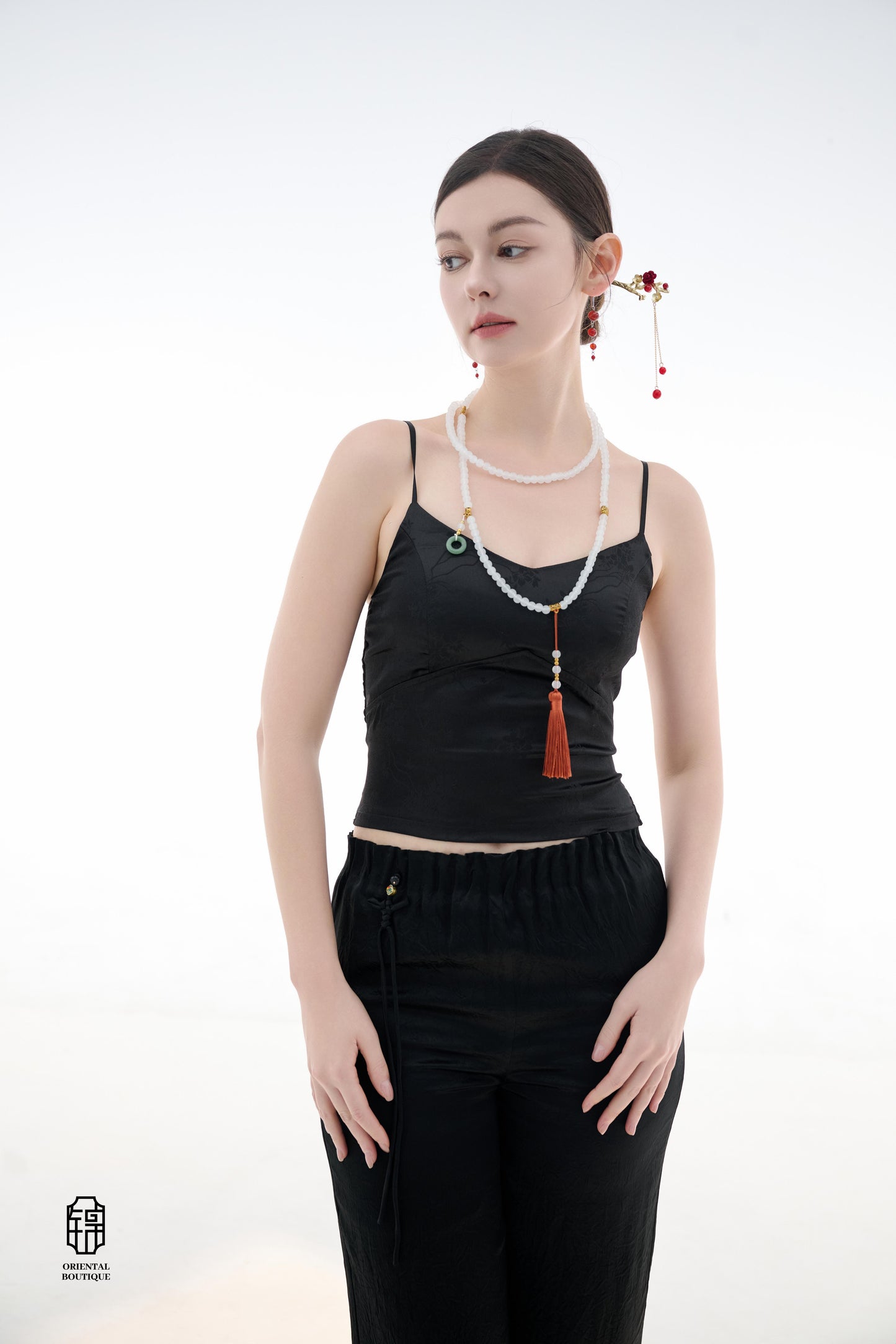 Midnight Silk Camisole,This lightweight camisole comes in classic black and elegant white, blending simplicity with a hint of allure. Crafted from airy silk fabric, it fits comfortably against the skin, beautifully highlighting the natural curves. The min