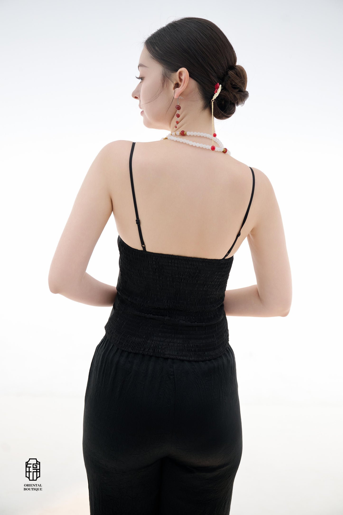 Midnight Silk Camisole,This lightweight camisole comes in classic black and elegant white, blending simplicity with a hint of allure. Crafted from airy silk fabric, it fits comfortably against the skin, beautifully highlighting the natural curves. The min