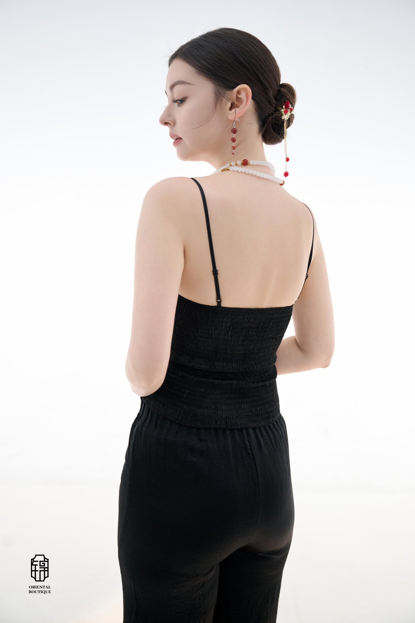Midnight Silk Camisole,This lightweight camisole comes in classic black and elegant white, blending simplicity with a hint of allure. Crafted from airy silk fabric, it fits comfortably against the skin, beautifully highlighting the natural curves. The min
