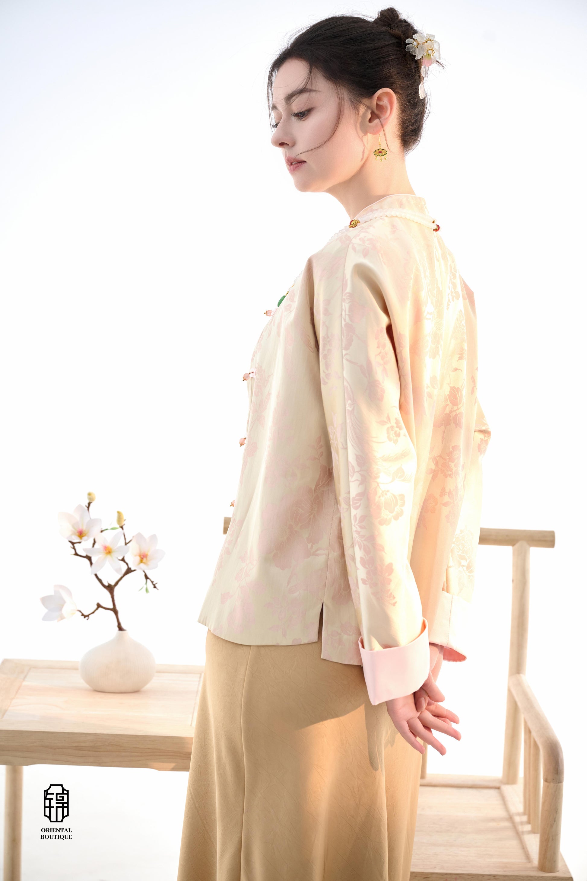 Blush Blossom Brocade Jacket,The Blush Blossom Brocade Jacket features a soft combination of blush pink and ivory, adorned with intricate floral brocade patterns, evoking a sense of elegance and grace. The frog button closures and stand-up collar add a to