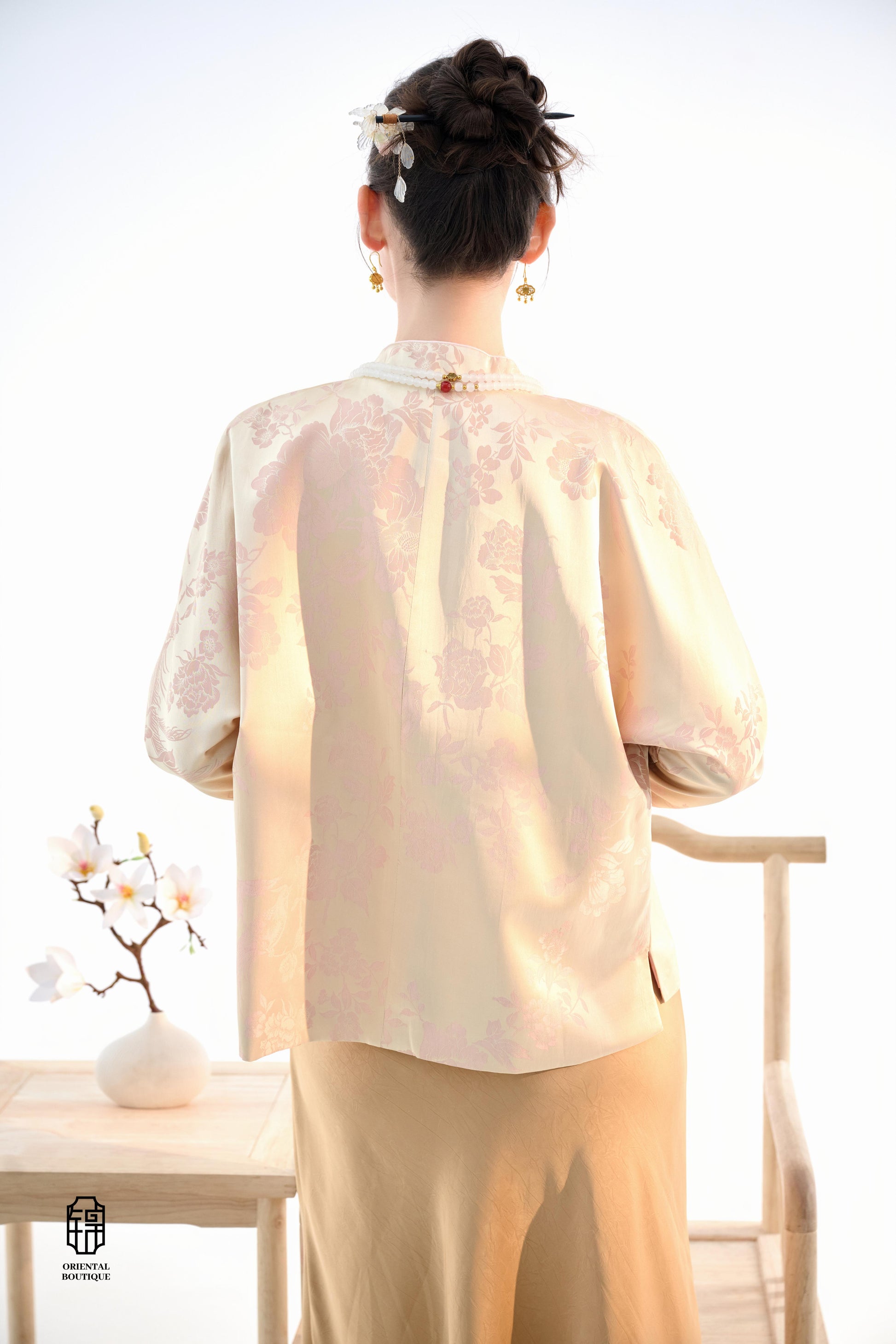 Blush Blossom Brocade Jacket,The Blush Blossom Brocade Jacket features a soft combination of blush pink and ivory, adorned with intricate floral brocade patterns, evoking a sense of elegance and grace. The frog button closures and stand-up collar add a to
