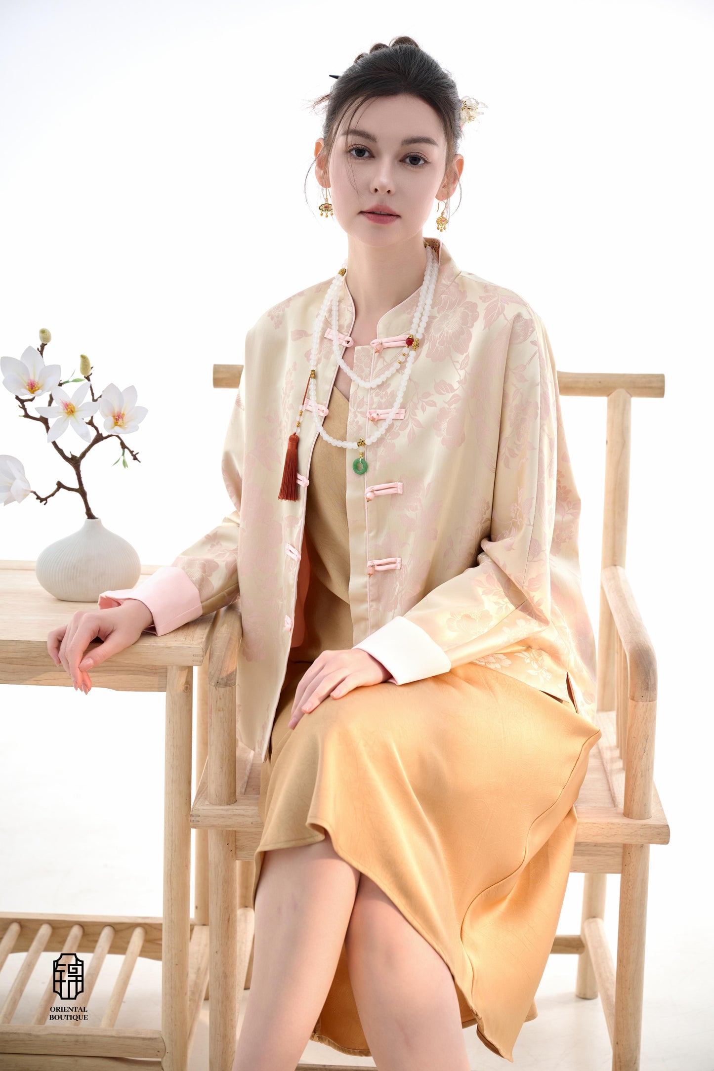 Blush Blossom Brocade Jacket,The Blush Blossom Brocade Jacket features a soft combination of blush pink and ivory, adorned with intricate floral brocade patterns, evoking a sense of elegance and grace. The frog button closures and stand-up collar add a to