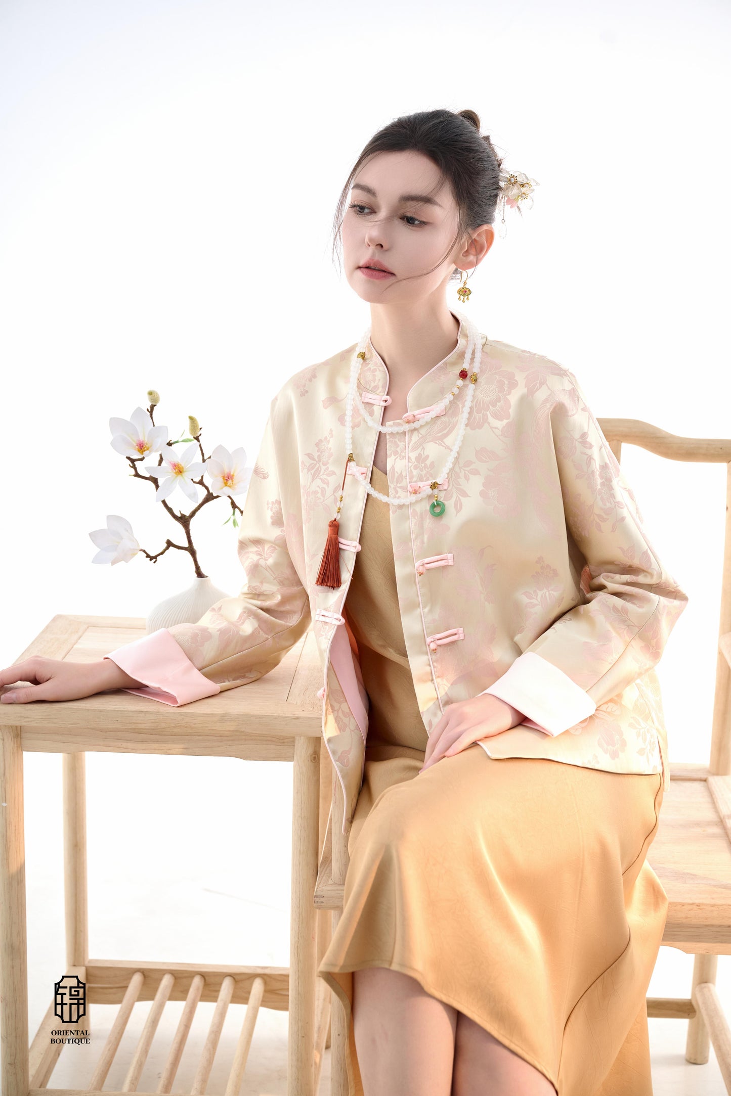 Blush Blossom Brocade Jacket,The Blush Blossom Brocade Jacket features a soft combination of blush pink and ivory, adorned with intricate floral brocade patterns, evoking a sense of elegance and grace. The frog button closures and stand-up collar add a to