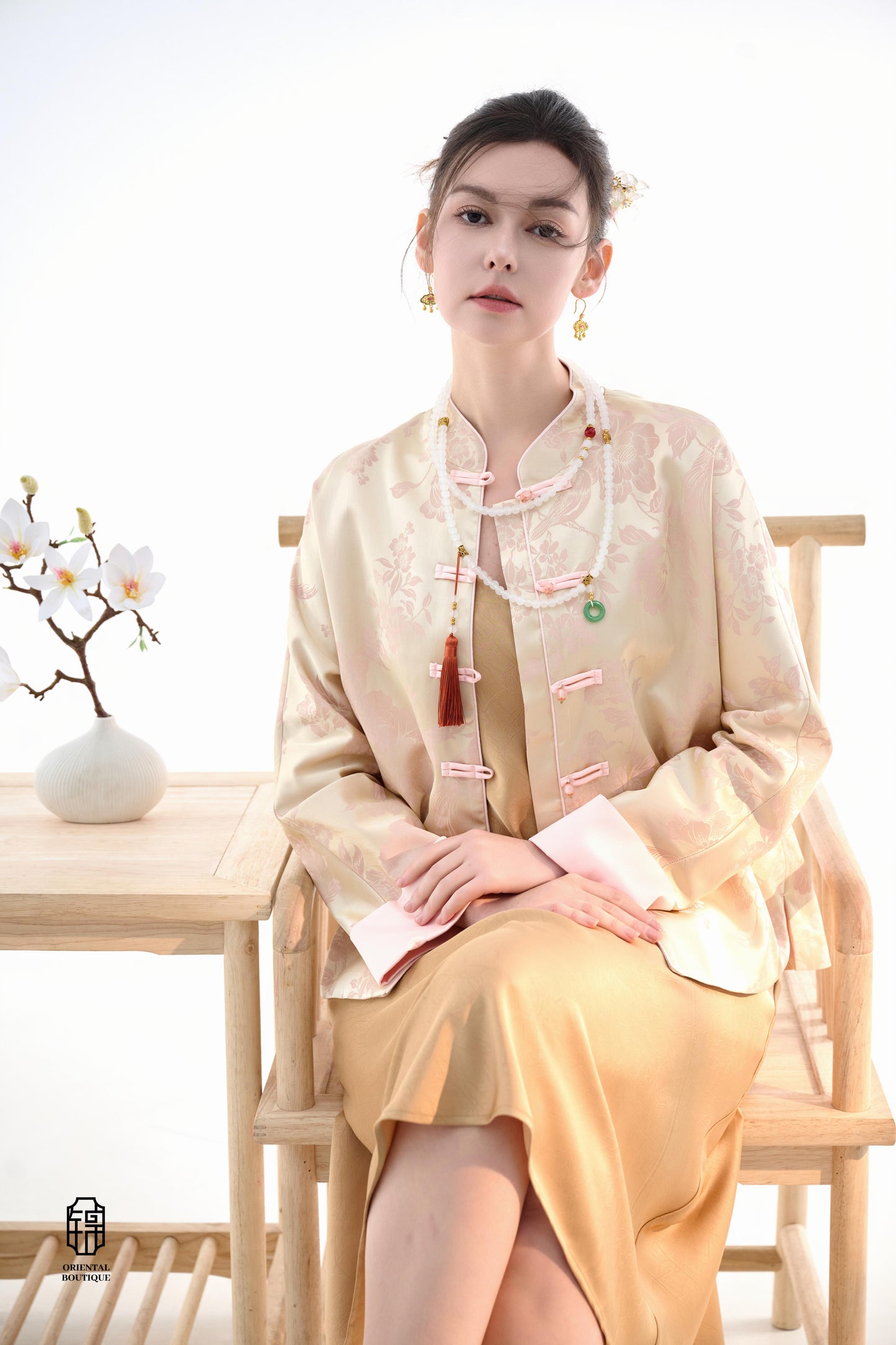Blush Blossom Brocade Jacket,The Blush Blossom Brocade Jacket features a soft combination of blush pink and ivory, adorned with intricate floral brocade patterns, evoking a sense of elegance and grace. The frog button closures and stand-up collar add a to