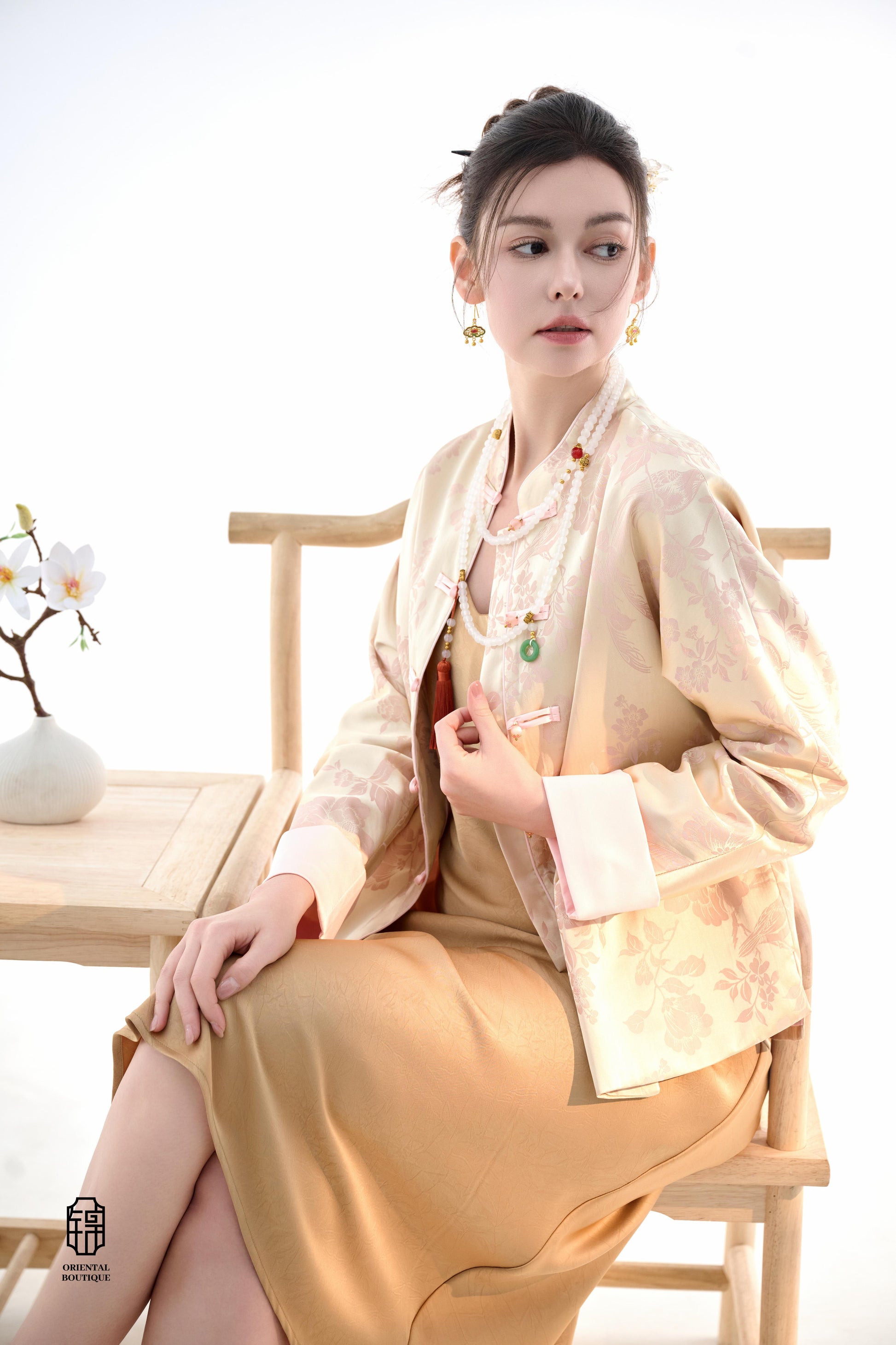 Blush Blossom Brocade Jacket,The Blush Blossom Brocade Jacket features a soft combination of blush pink and ivory, adorned with intricate floral brocade patterns, evoking a sense of elegance and grace. The frog button closures and stand-up collar add a to