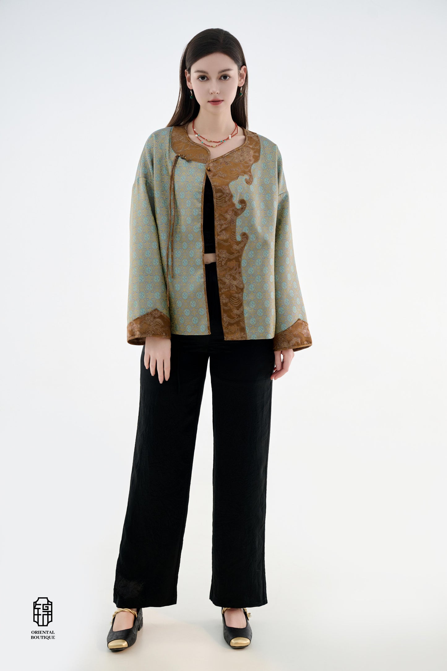 Azure Cloud Pattern Jacket,The Azure Cloud Pattern Jacket blends classical aesthetics with modern tailoring, drawing inspiration from the traditional Chinese blue and white porcelain motifs. The light blue and pale gold brocade fabric resembles the flowin