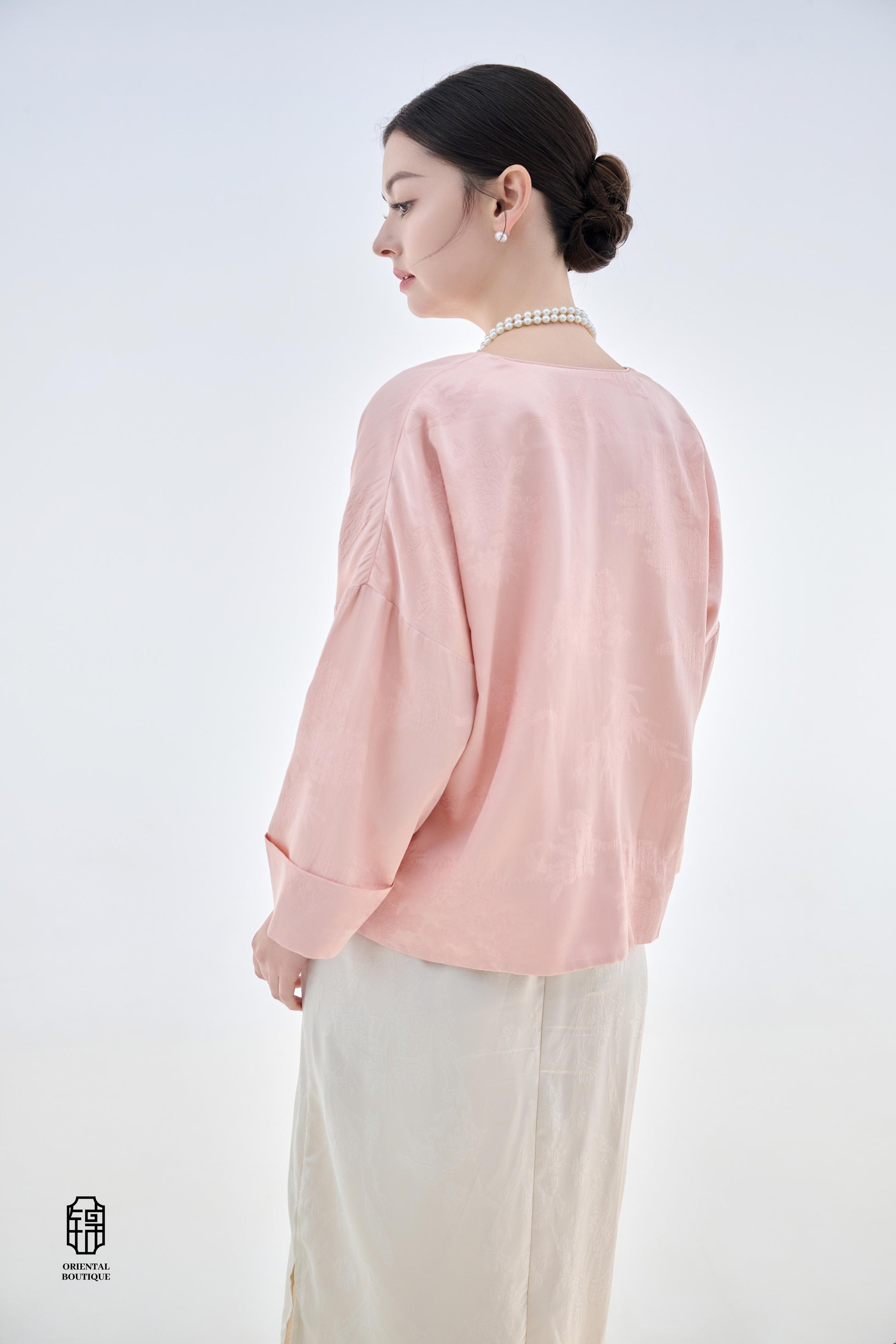 Dawn Pink Brocade Jacket,The Dawn Pink Brocade Jacket is crafted from soft pink silk fabric, offering an elegant and graceful design that exudes a gentle charm. The jacket features subtle brocade patterns on the surface, adding an understated yet refined