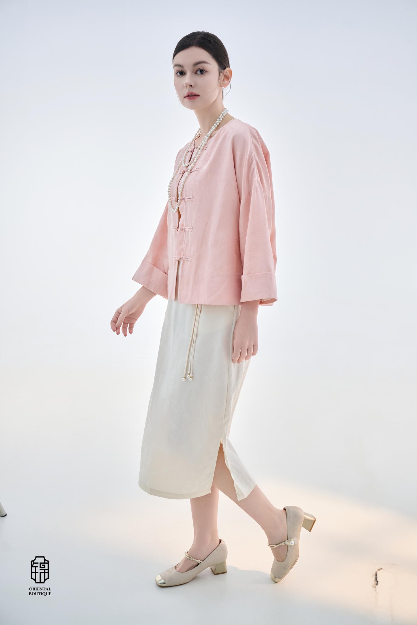 Dawn Pink Brocade Jacket,The Dawn Pink Brocade Jacket is crafted from soft pink silk fabric, offering an elegant and graceful design that exudes a gentle charm. The jacket features subtle brocade patterns on the surface, adding an understated yet refined
