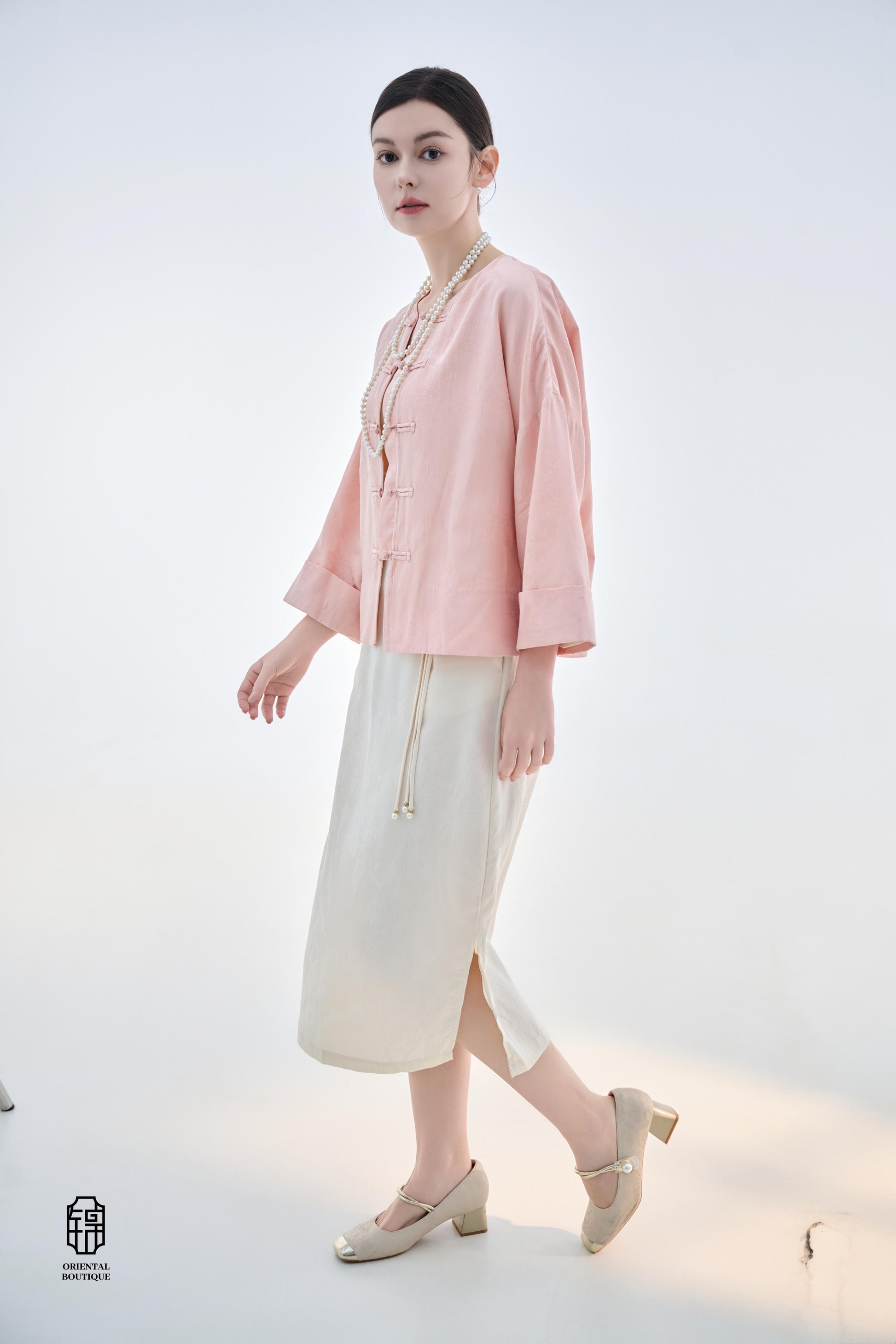 Dawn Pink Brocade Jacket,The Dawn Pink Brocade Jacket is crafted from soft pink silk fabric, offering an elegant and graceful design that exudes a gentle charm. The jacket features subtle brocade patterns on the surface, adding an understated yet refined