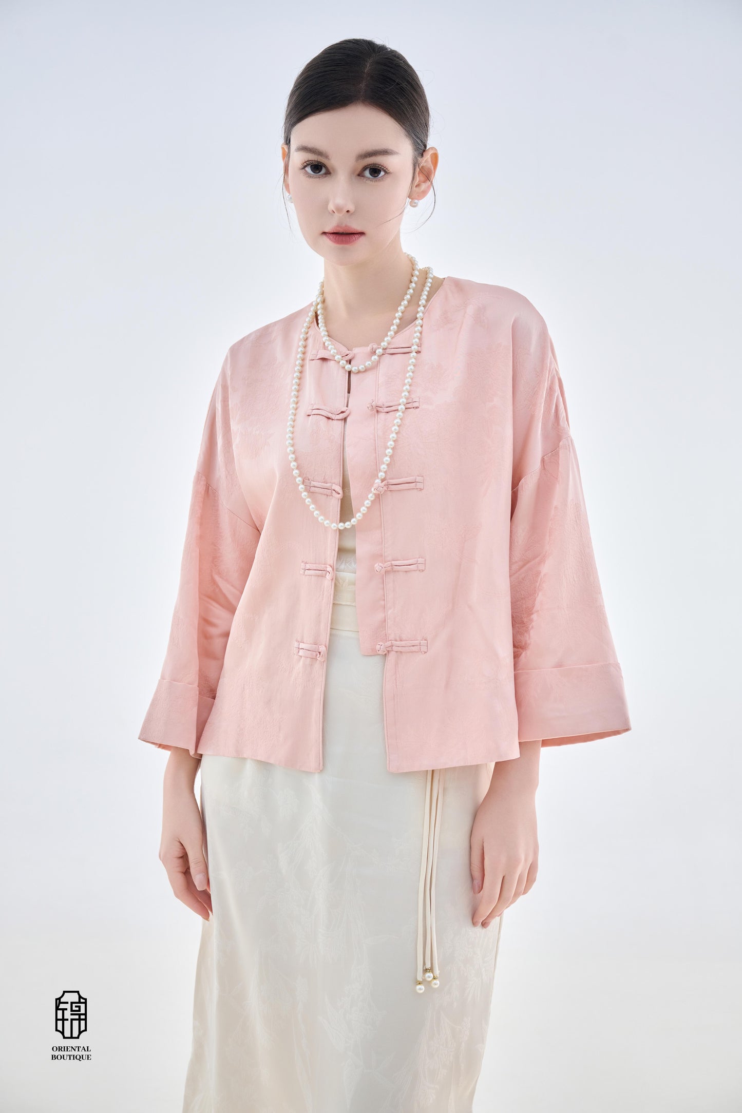 Dawn Pink Brocade Jacket,The Dawn Pink Brocade Jacket is crafted from soft pink silk fabric, offering an elegant and graceful design that exudes a gentle charm. The jacket features subtle brocade patterns on the surface, adding an understated yet refined
