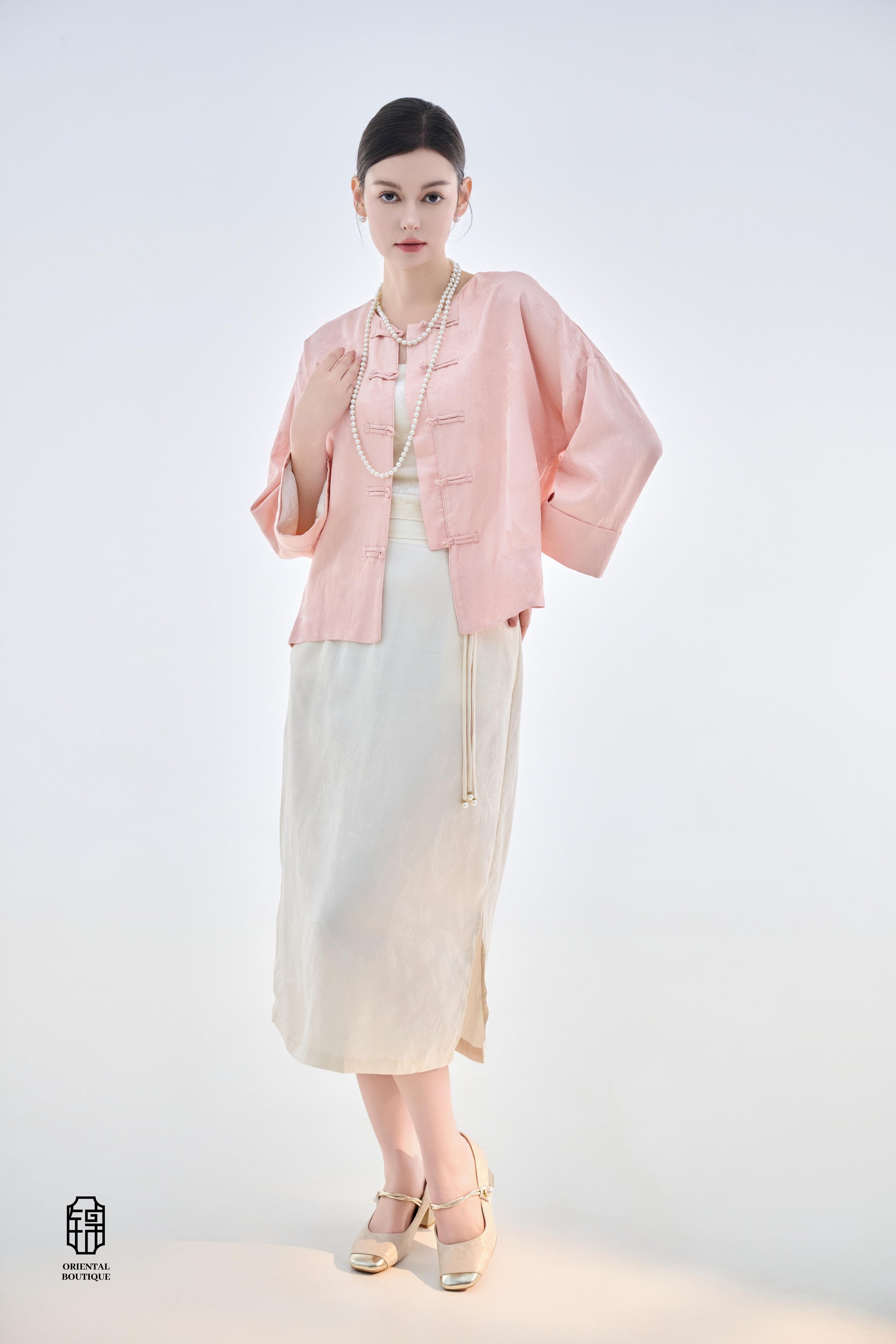 Dawn Pink Brocade Jacket,The Dawn Pink Brocade Jacket is crafted from soft pink silk fabric, offering an elegant and graceful design that exudes a gentle charm. The jacket features subtle brocade patterns on the surface, adding an understated yet refined