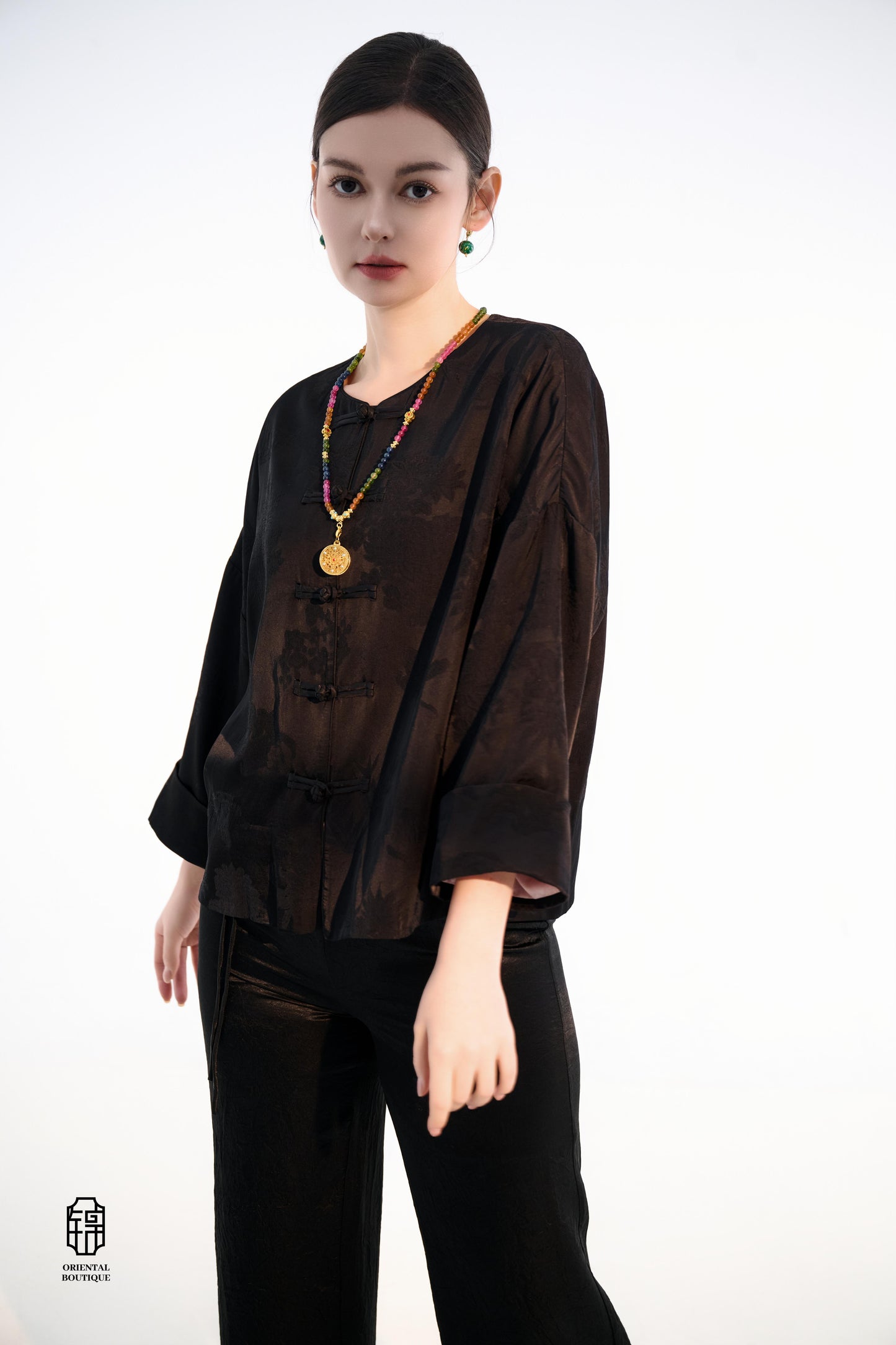 Button-up Collarless Jacket ,The Blush Sleeve Silk Jacket combines traditional and modern design elements in a sleek black silk outerwear piece. The main body is made from high-quality black silk, exuding a luxurious yet understated elegance, with subtle