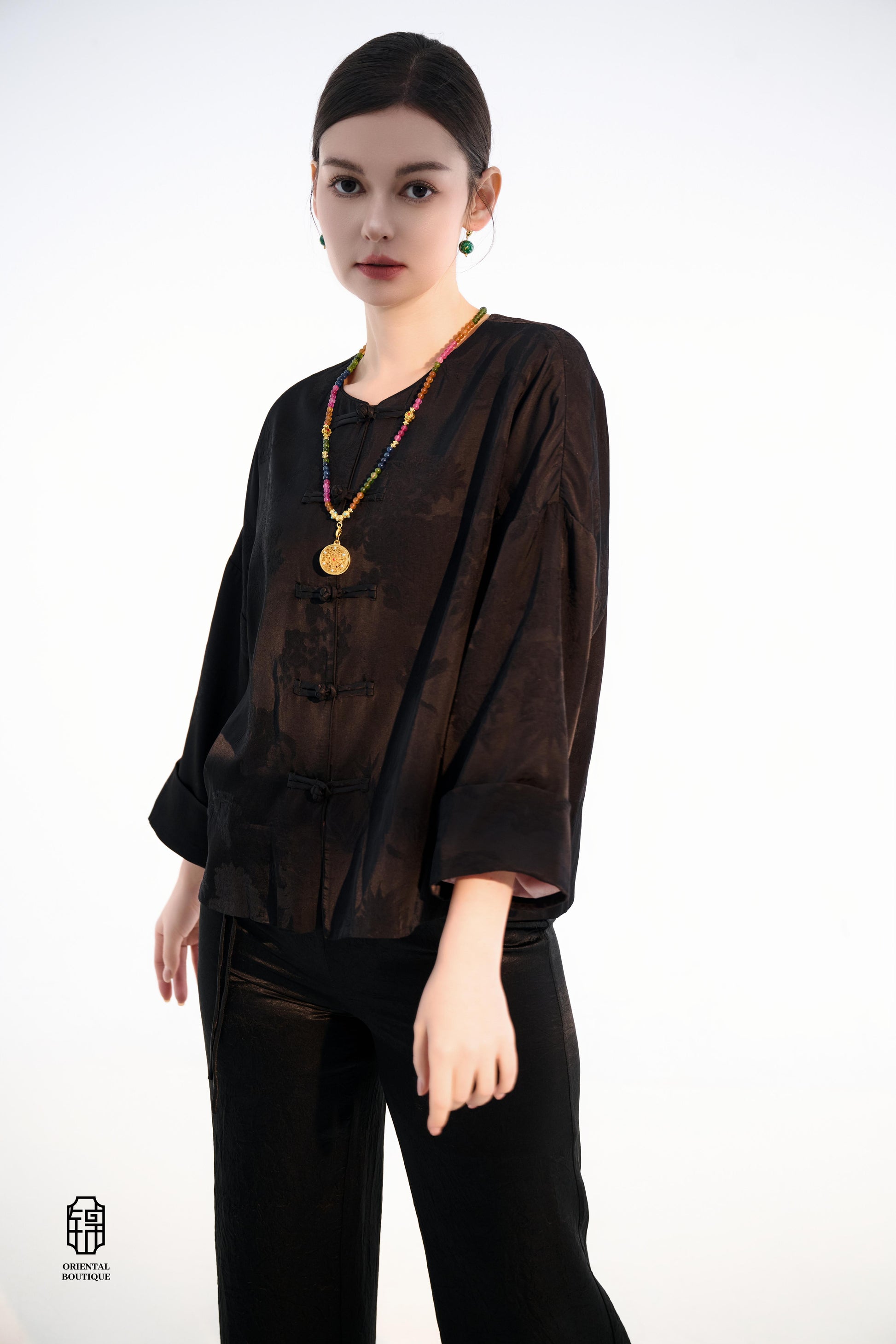 Button-up Collarless Jacket ,The Blush Sleeve Silk Jacket combines traditional and modern design elements in a sleek black silk outerwear piece. The main body is made from high-quality black silk, exuding a luxurious yet understated elegance, with subtle