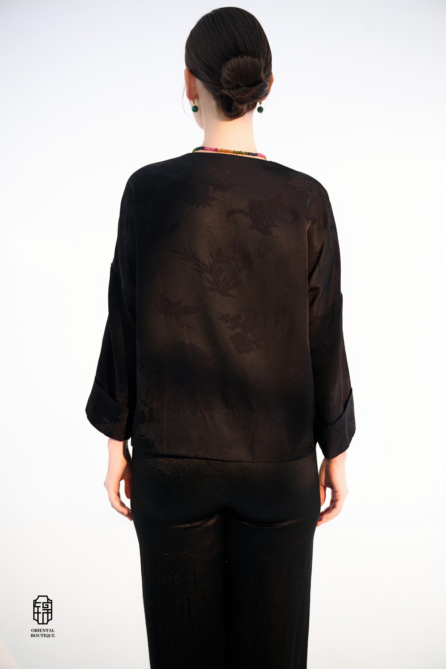Button-up Collarless Jacket ,The Blush Sleeve Silk Jacket combines traditional and modern design elements in a sleek black silk outerwear piece. The main body is made from high-quality black silk, exuding a luxurious yet understated elegance, with subtle