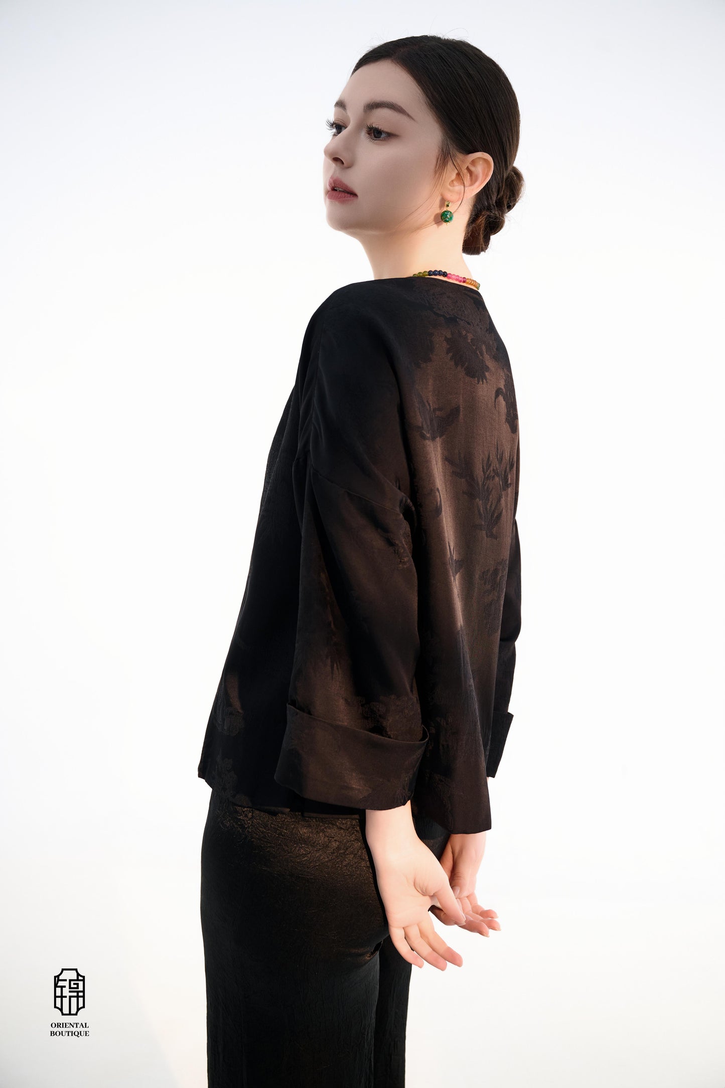 Button-up Collarless Jacket ,The Blush Sleeve Silk Jacket combines traditional and modern design elements in a sleek black silk outerwear piece. The main body is made from high-quality black silk, exuding a luxurious yet understated elegance, with subtle