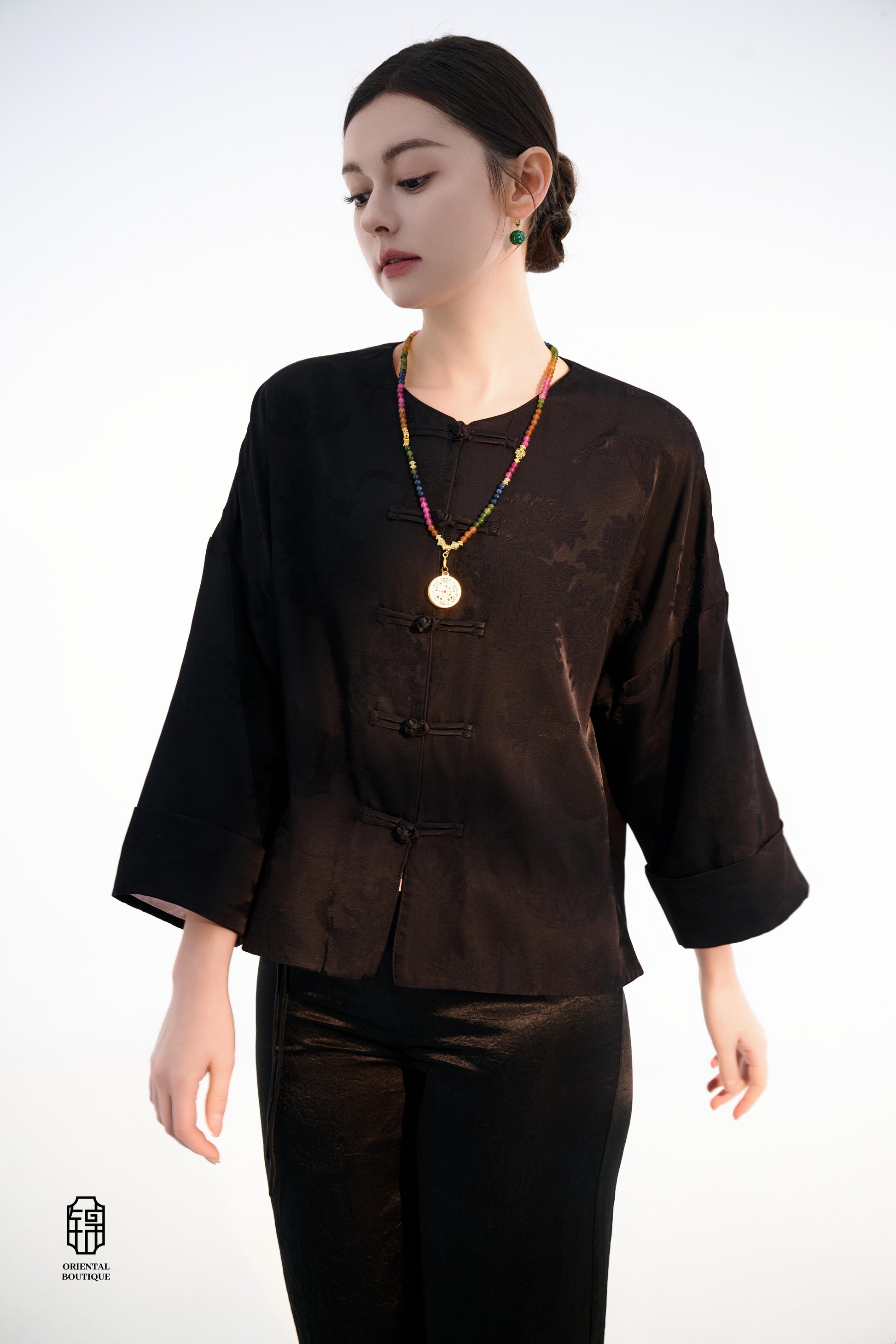 Button-up Collarless Jacket ,The Blush Sleeve Silk Jacket combines traditional and modern design elements in a sleek black silk outerwear piece. The main body is made from high-quality black silk, exuding a luxurious yet understated elegance, with subtle