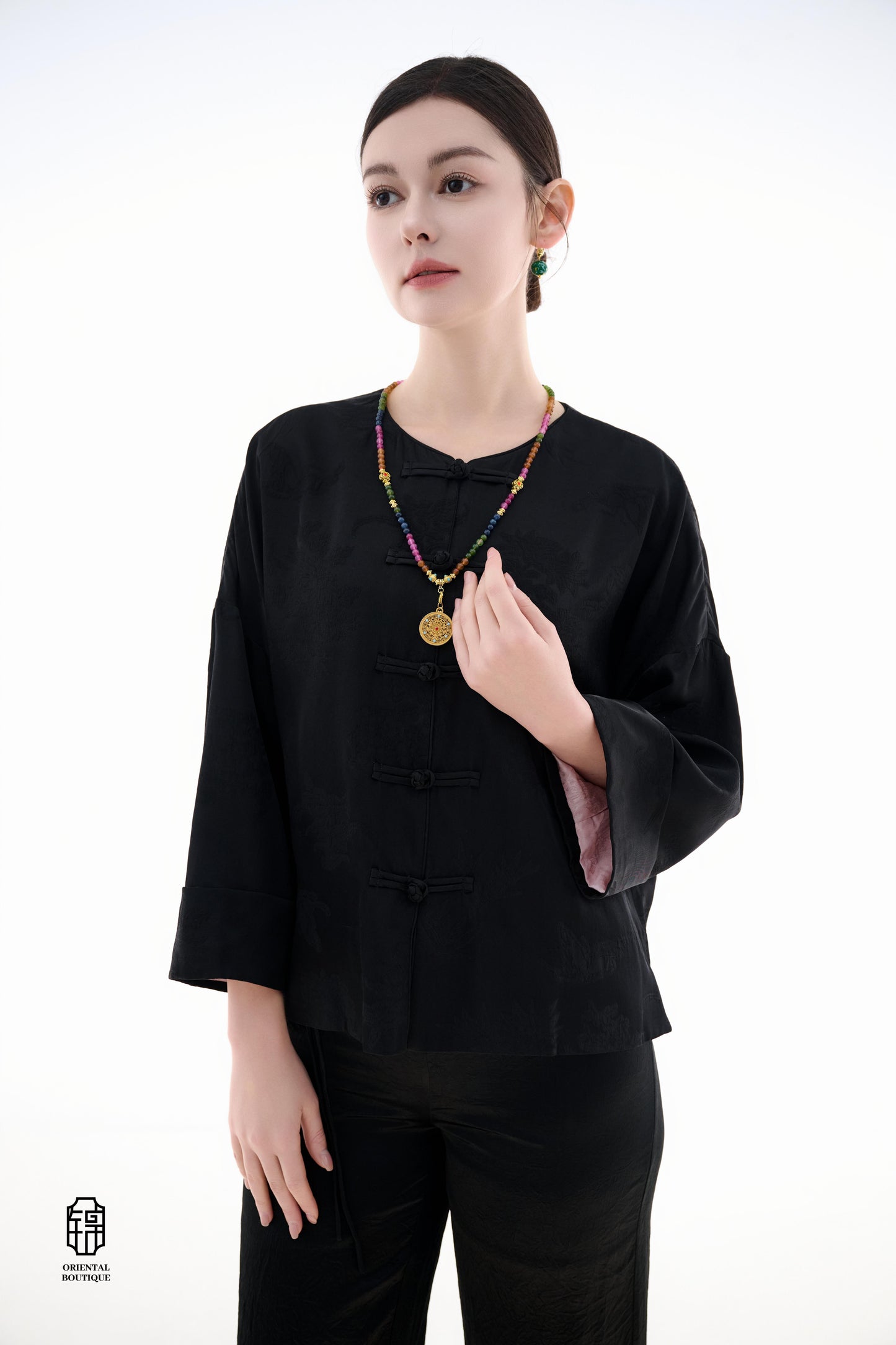Button-up Collarless Jacket ,The Blush Sleeve Silk Jacket combines traditional and modern design elements in a sleek black silk outerwear piece. The main body is made from high-quality black silk, exuding a luxurious yet understated elegance, with subtle