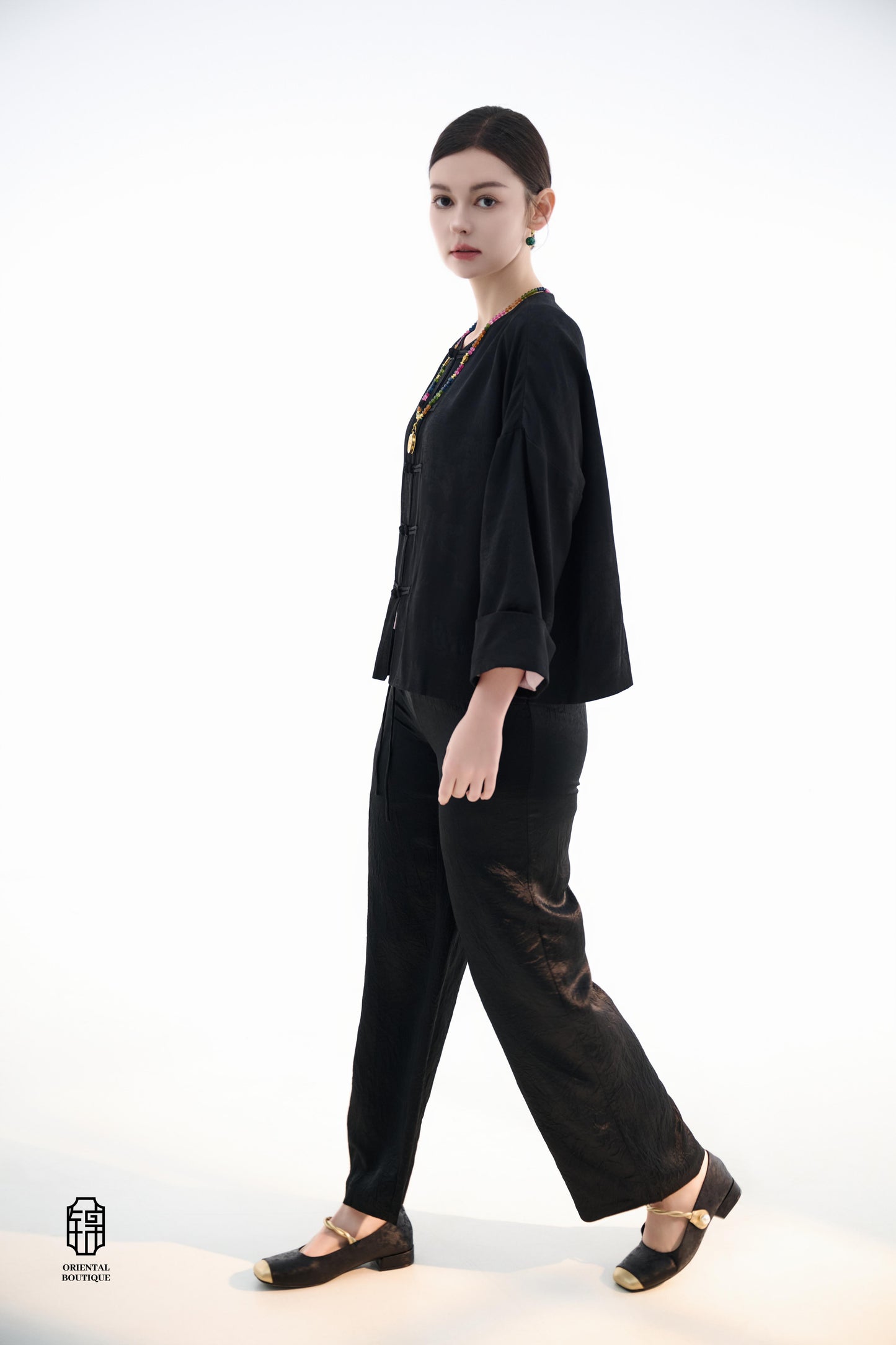 Button-up Collarless Jacket ,The Blush Sleeve Silk Jacket combines traditional and modern design elements in a sleek black silk outerwear piece. The main body is made from high-quality black silk, exuding a luxurious yet understated elegance, with subtle