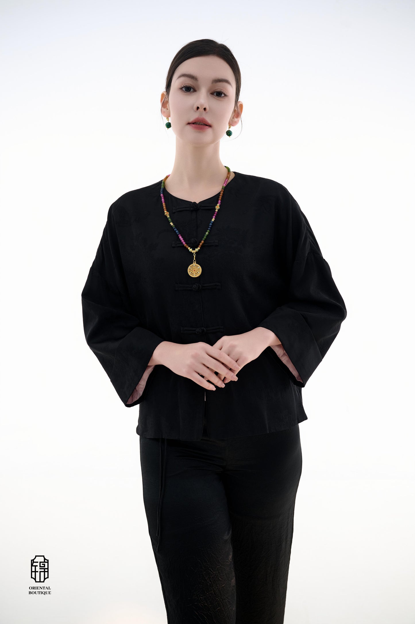 Button-up Collarless Jacket ,The Blush Sleeve Silk Jacket combines traditional and modern design elements in a sleek black silk outerwear piece. The main body is made from high-quality black silk, exuding a luxurious yet understated elegance, with subtle