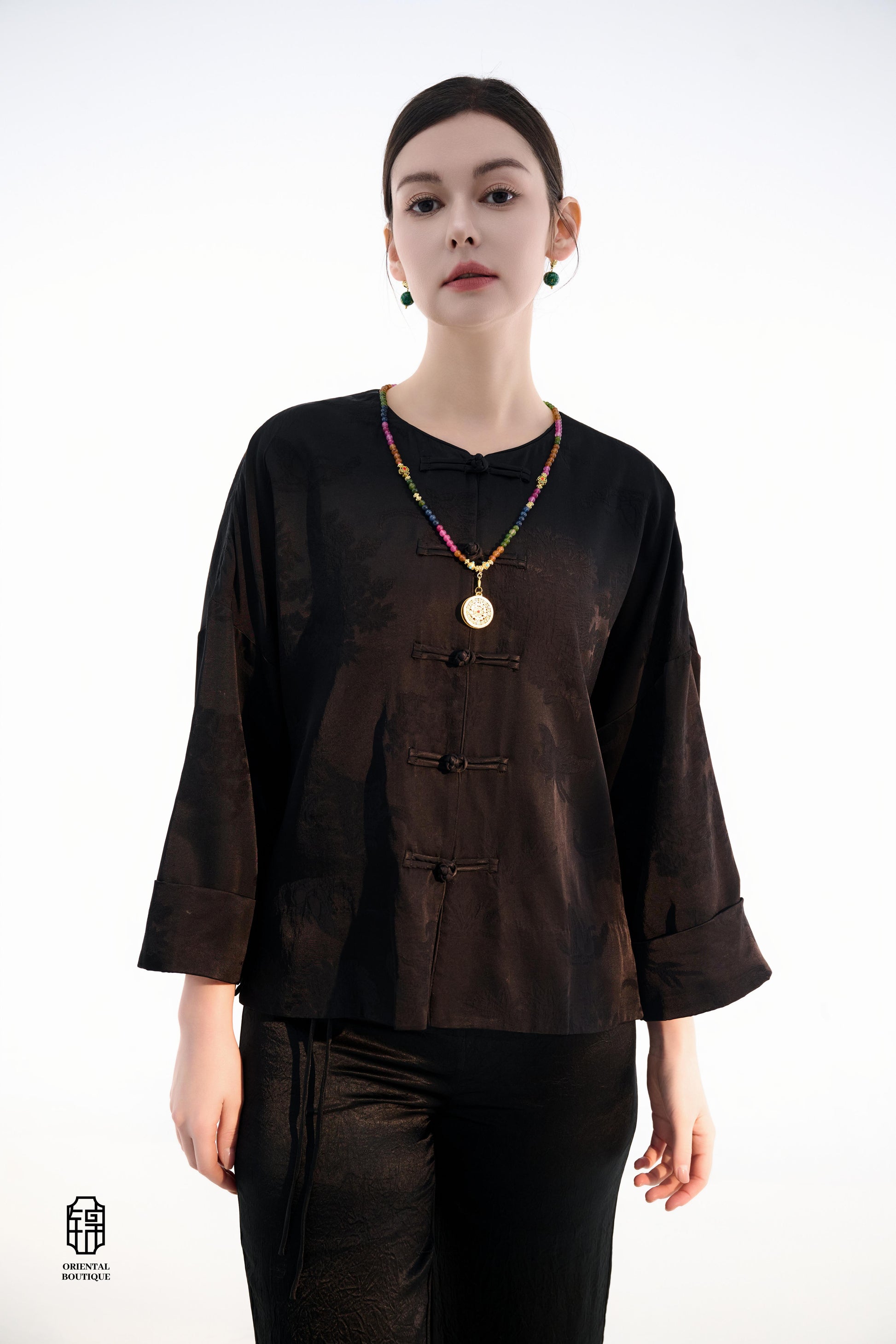 Button-up Collarless Jacket ,The Blush Sleeve Silk Jacket combines traditional and modern design elements in a sleek black silk outerwear piece. The main body is made from high-quality black silk, exuding a luxurious yet understated elegance, with subtle