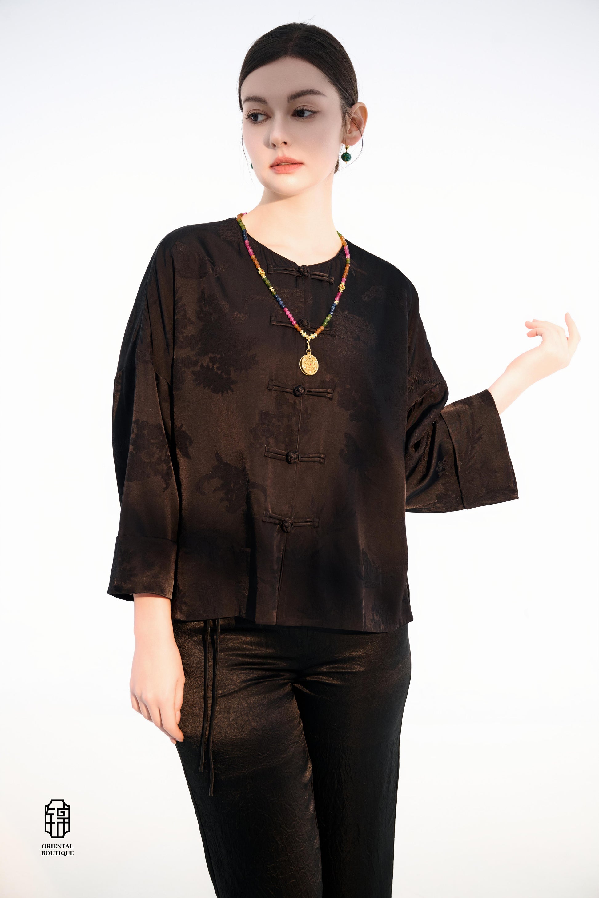 Button-up Collarless Jacket ,The Blush Sleeve Silk Jacket combines traditional and modern design elements in a sleek black silk outerwear piece. The main body is made from high-quality black silk, exuding a luxurious yet understated elegance, with subtle