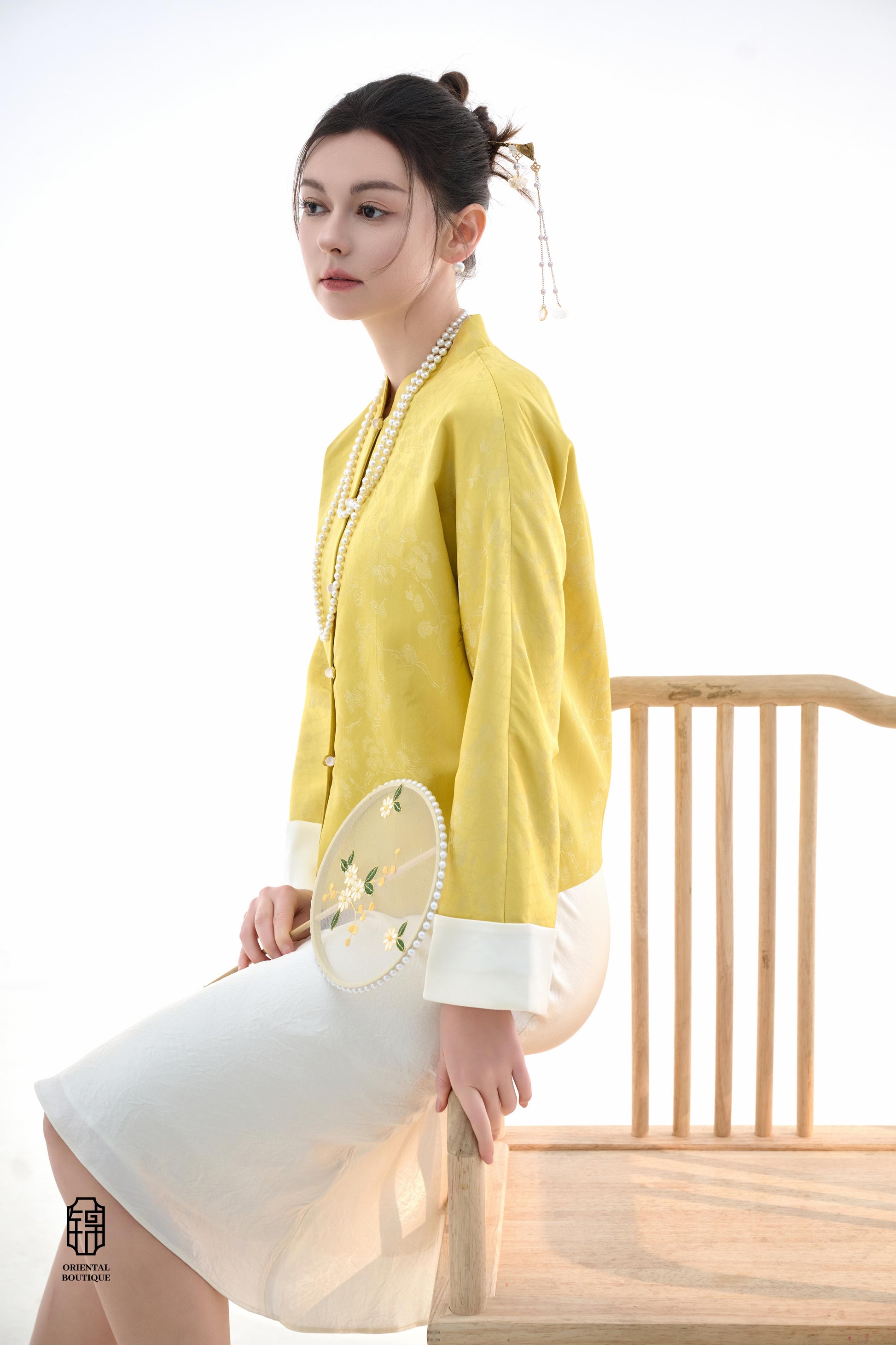 Golden Silk Fortune Blouse,The Golden Silk Fortune Blouse is crafted from vibrant golden silk, symbolizing prosperity and good fortune. The clean, high-neck design is paired with delicate jacquard patterns, exuding a sense of noble elegance. White cuffs p
