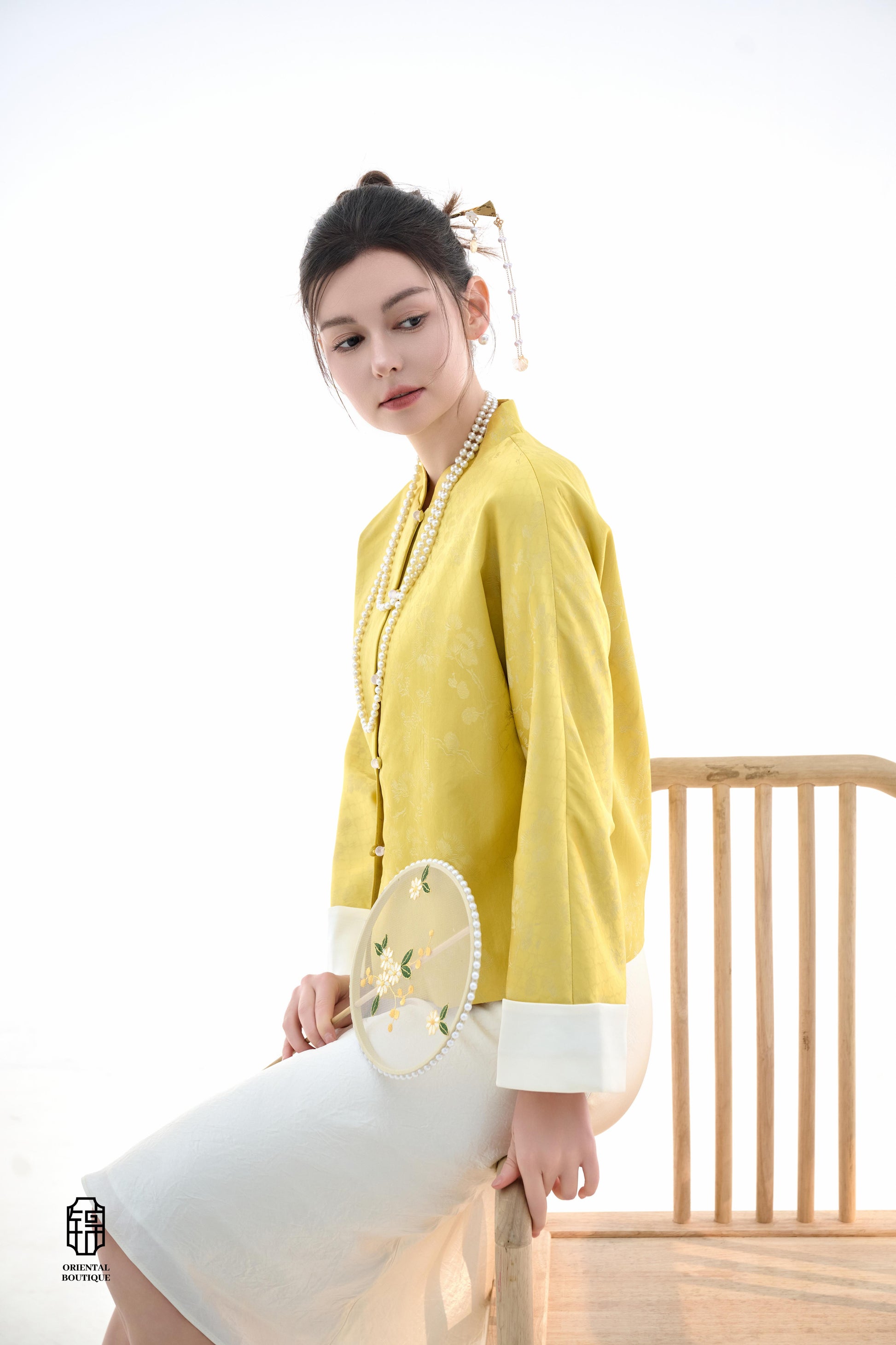 Golden Silk Fortune Blouse,The Golden Silk Fortune Blouse is crafted from vibrant golden silk, symbolizing prosperity and good fortune. The clean, high-neck design is paired with delicate jacquard patterns, exuding a sense of noble elegance. White cuffs p