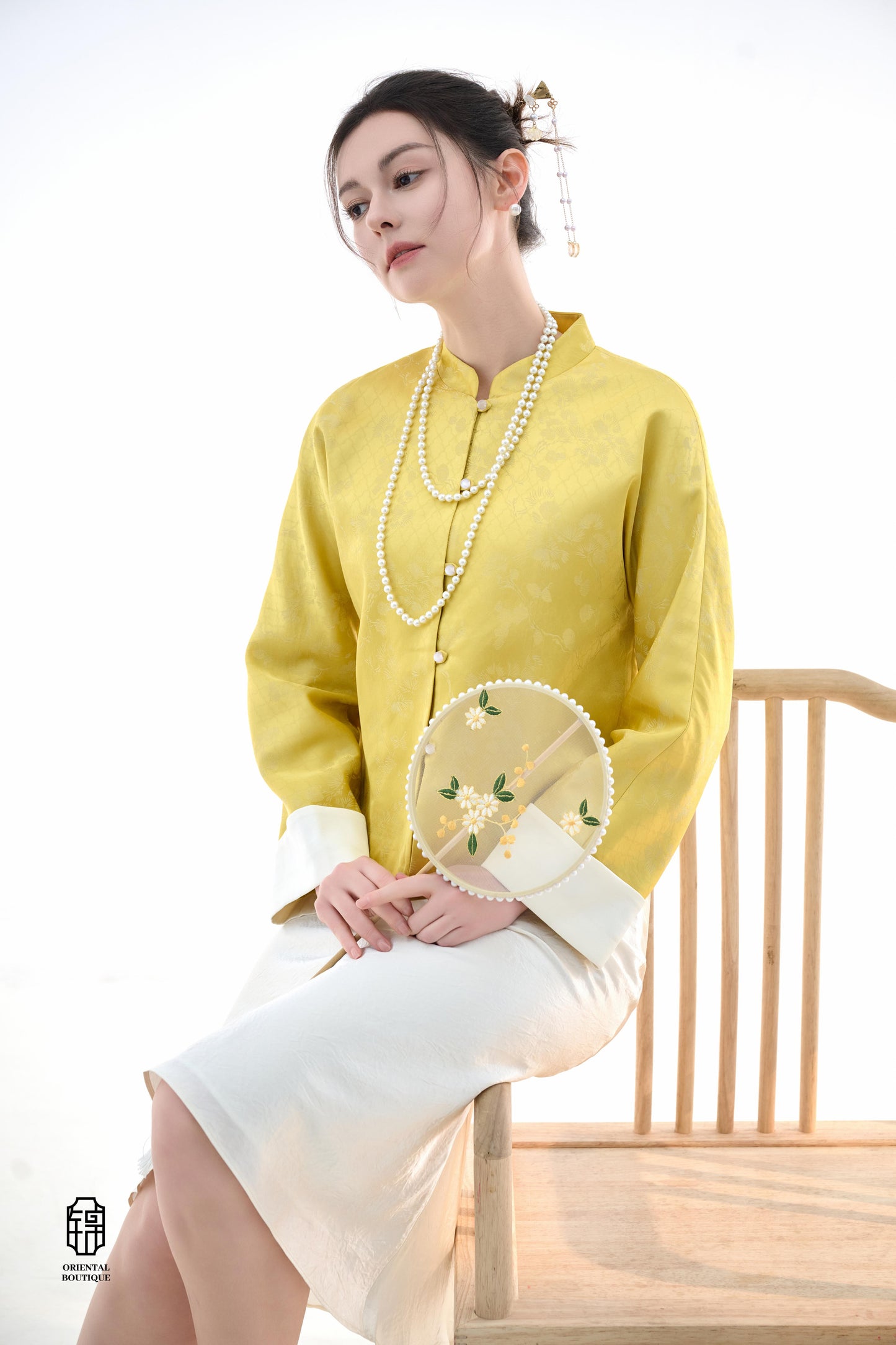 Golden Silk Fortune Blouse,The Golden Silk Fortune Blouse is crafted from vibrant golden silk, symbolizing prosperity and good fortune. The clean, high-neck design is paired with delicate jacquard patterns, exuding a sense of noble elegance. White cuffs p