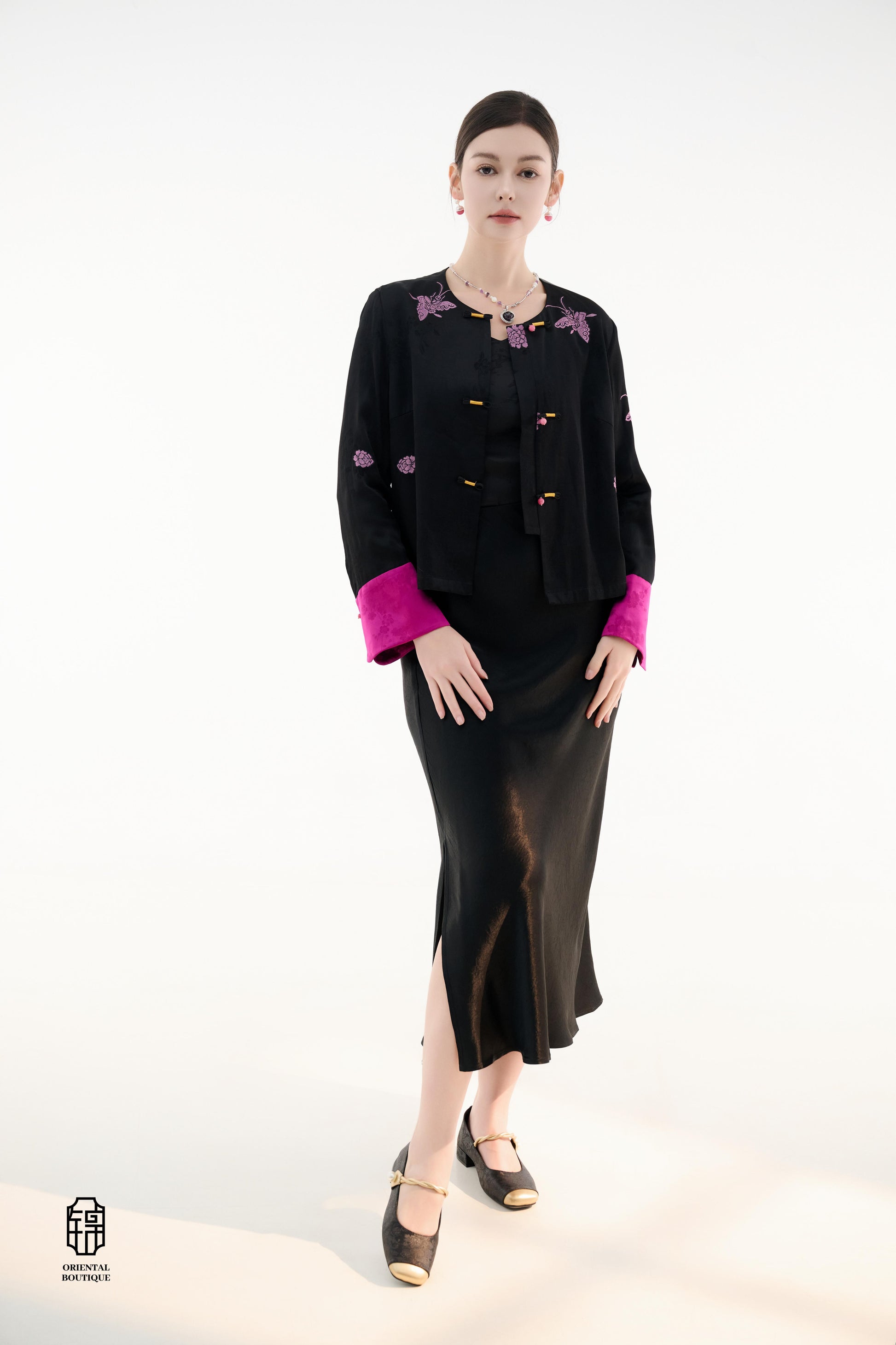 Purple Butterfly Grace Jacket,The Purple Butterfly Grace Jacket is a black outerwear piece that blends classical and modern aesthetics. Adorned with delicate purple butterfly and floral embroidery, it symbolizes elegance and romance. The unique button des