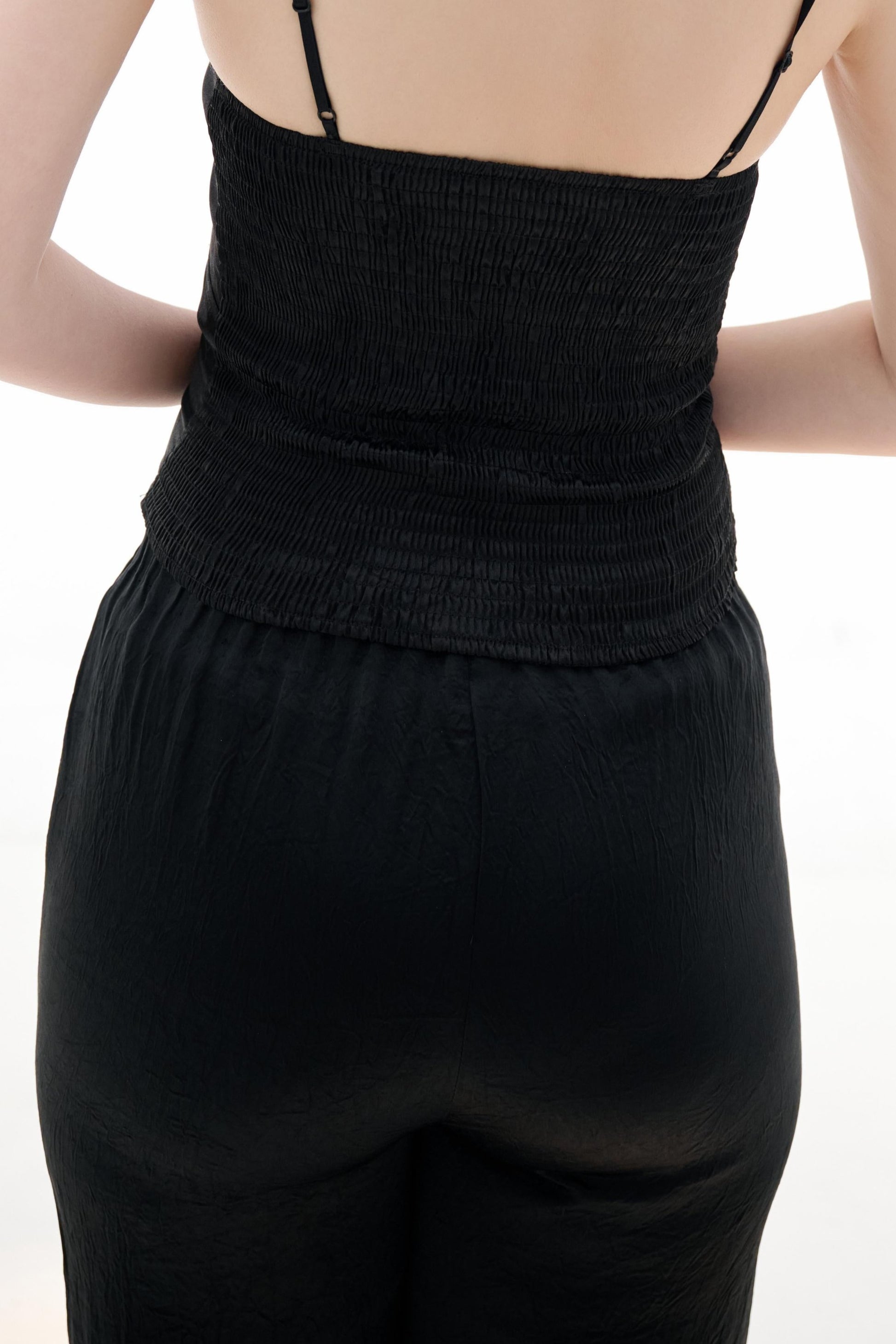 Silk Pants,These silk pants are crafted from high-quality silk fabric, offering a luxuriously smooth and delicate feel for an exceptional wearing experience. The simple design is paired with a high-waisted cut to elegantly accentuate the figure, enhancing