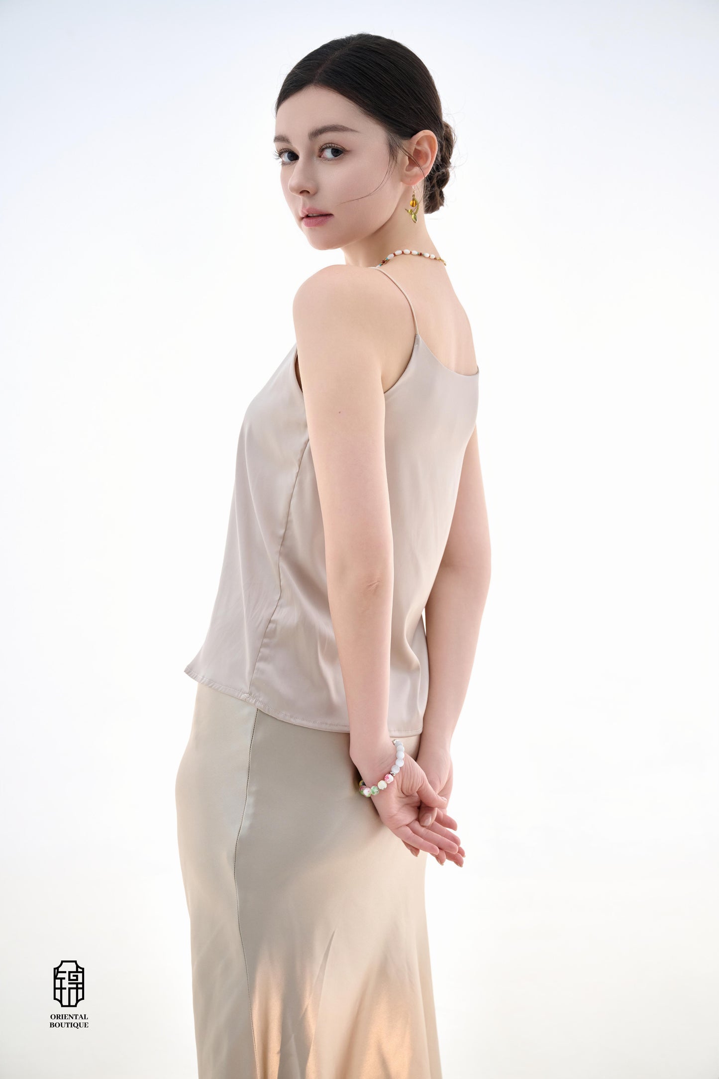 Silk Mermaid Skirt,This silk mermaid skirt features a classic design that gracefully accentuates curves, making it suitable for a variety of occasions. The champagne version is crafted from smooth silk, exuding an air of elegance and sophistication, while