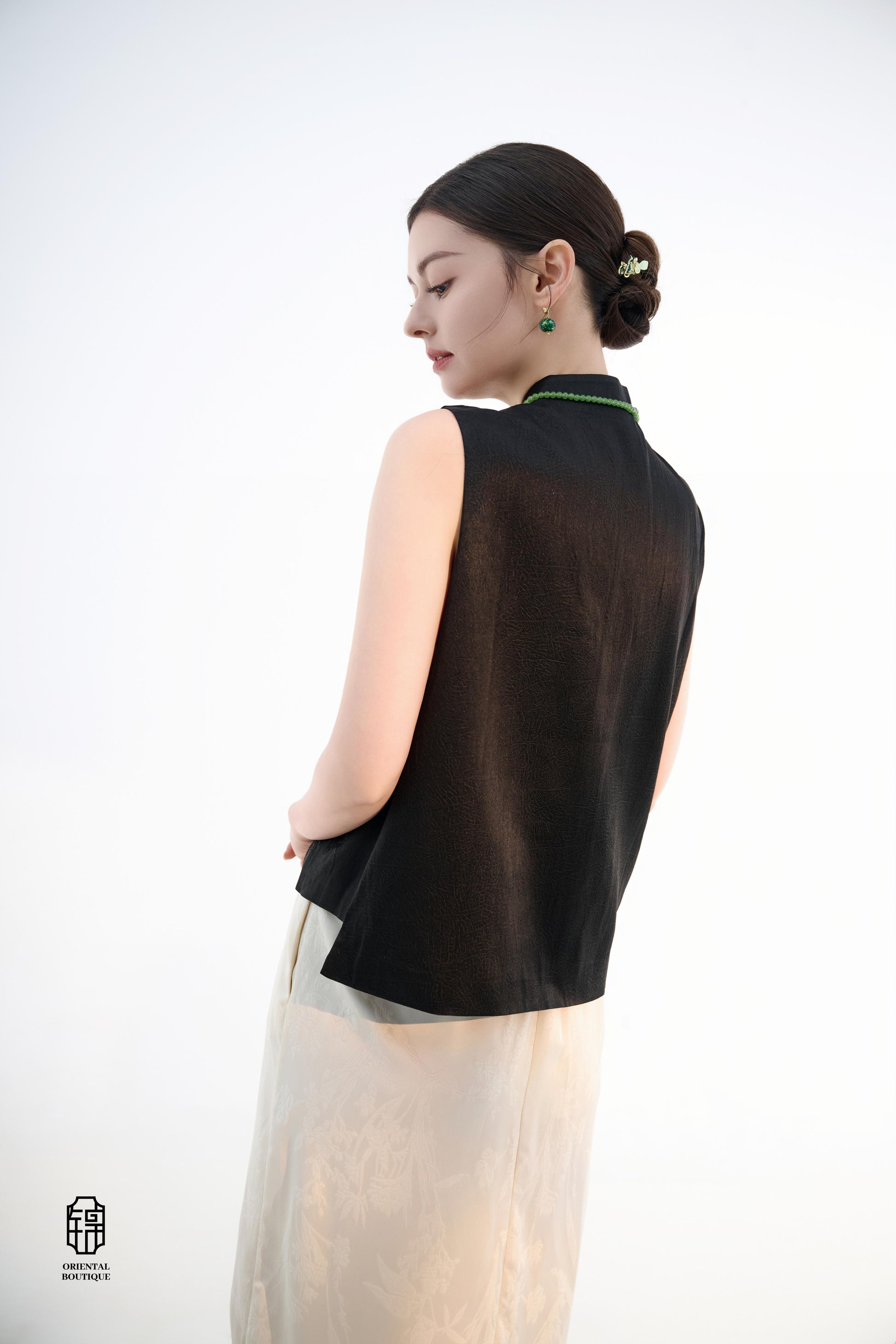 Black Lotus Sleeveless Top,The Black Lotus Sleeveless Top is a sophisticated sleeveless garment, featuring a sleek black tone crafted from luxurious silk fabric, offering a lightweight and smooth texture. The top is adorned with subtle jacquard embroidery