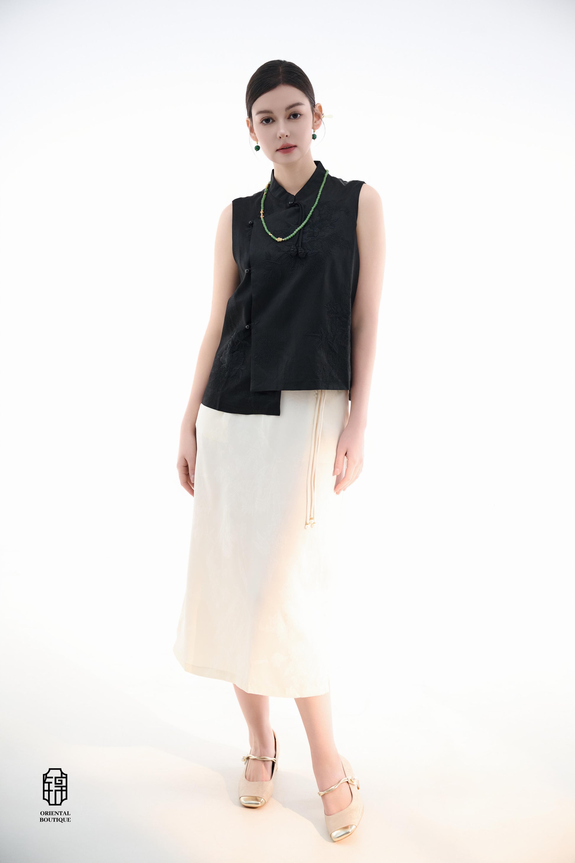 Black Lotus Sleeveless Top,The Black Lotus Sleeveless Top is a sophisticated sleeveless garment, featuring a sleek black tone crafted from luxurious silk fabric, offering a lightweight and smooth texture. The top is adorned with subtle jacquard embroidery
