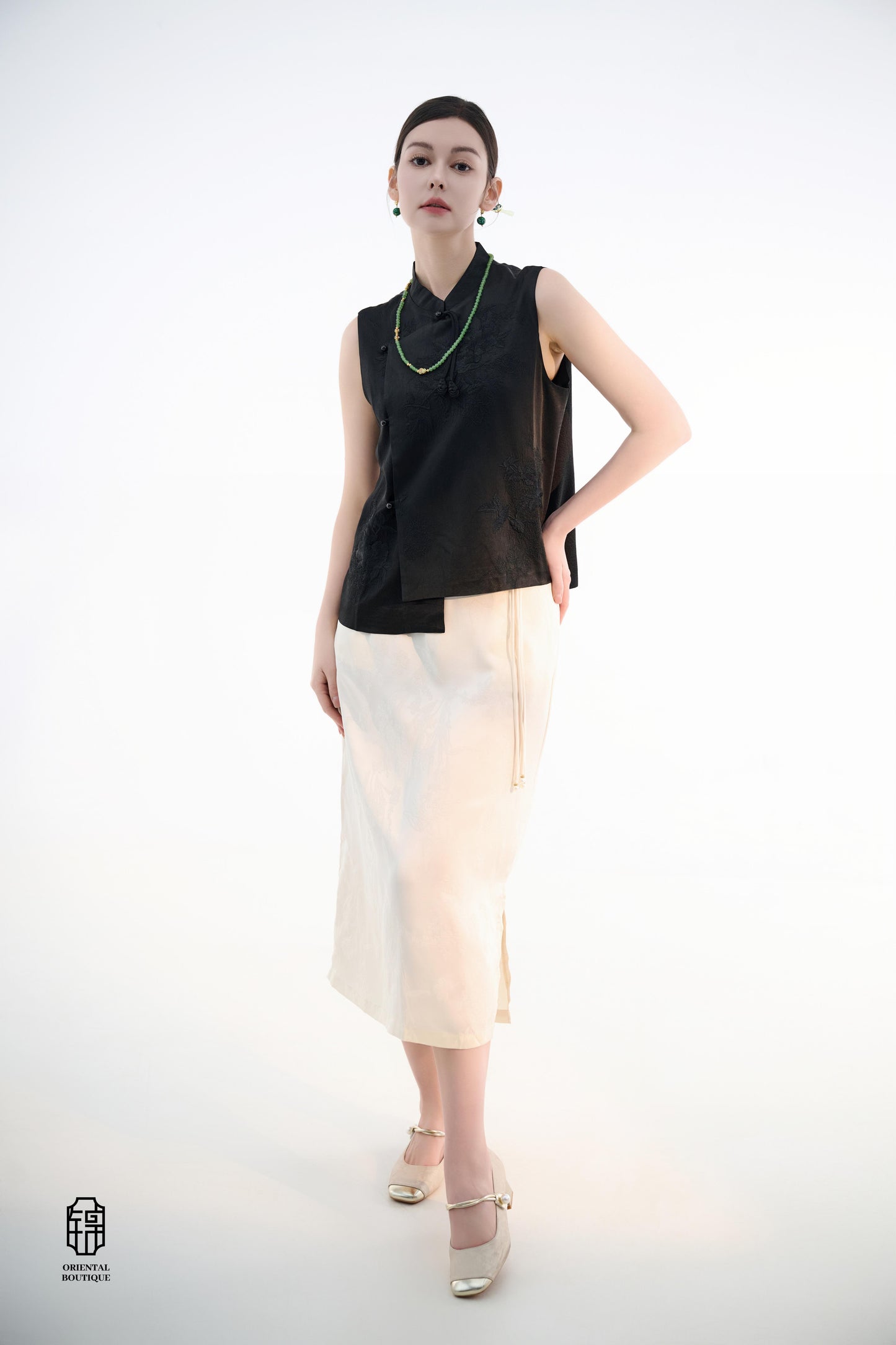 Black Lotus Sleeveless Top,The Black Lotus Sleeveless Top is a sophisticated sleeveless garment, featuring a sleek black tone crafted from luxurious silk fabric, offering a lightweight and smooth texture. The top is adorned with subtle jacquard embroidery