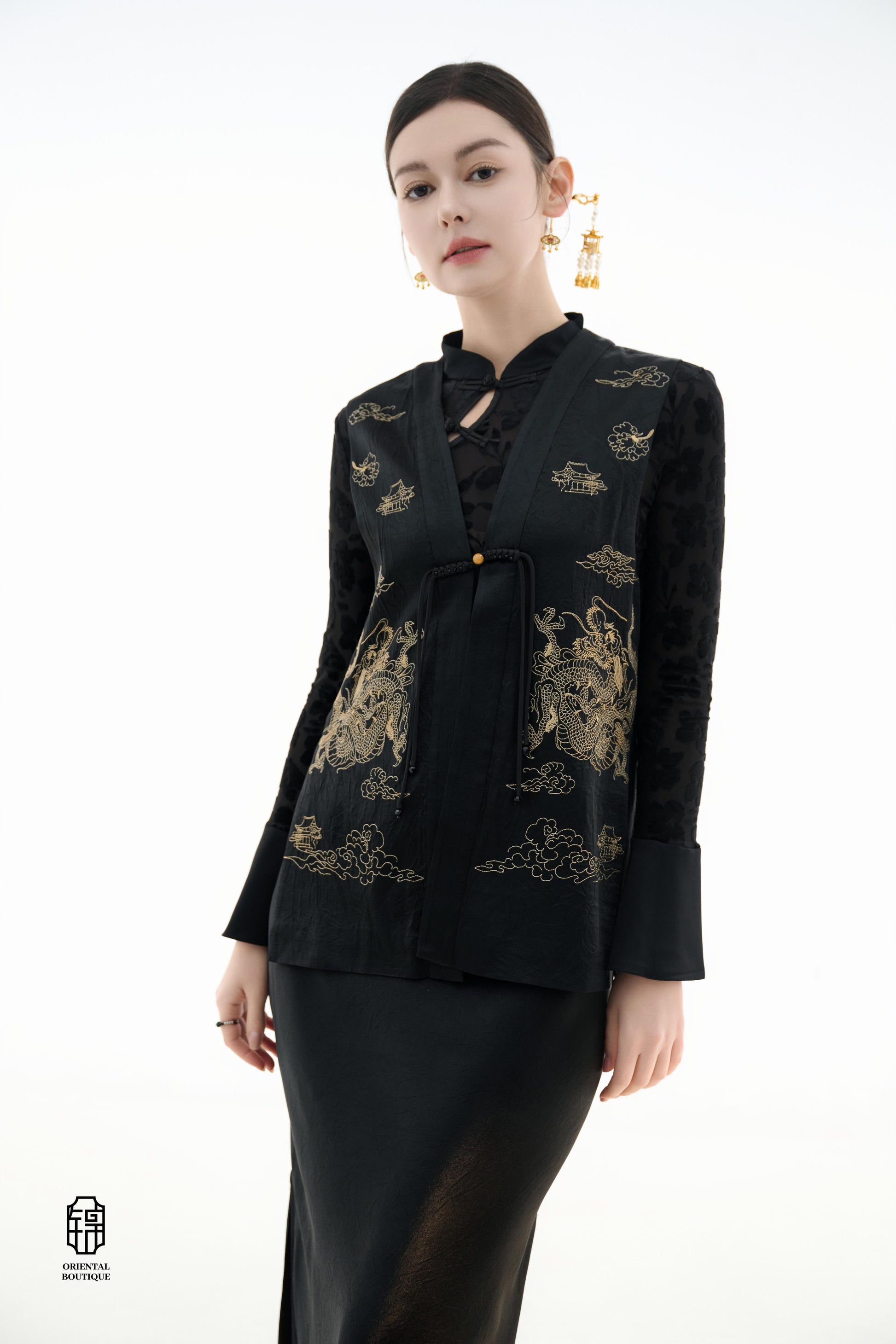 Dragon Soaring Brocade Vest,The Dragon Soaring Brocade Jacket features a deep black base with intricate golden dragon embroidery, exuding a dignified and regal aura. The front of the jacket is adorned with delicate gold thread patterns, depicting dragons,