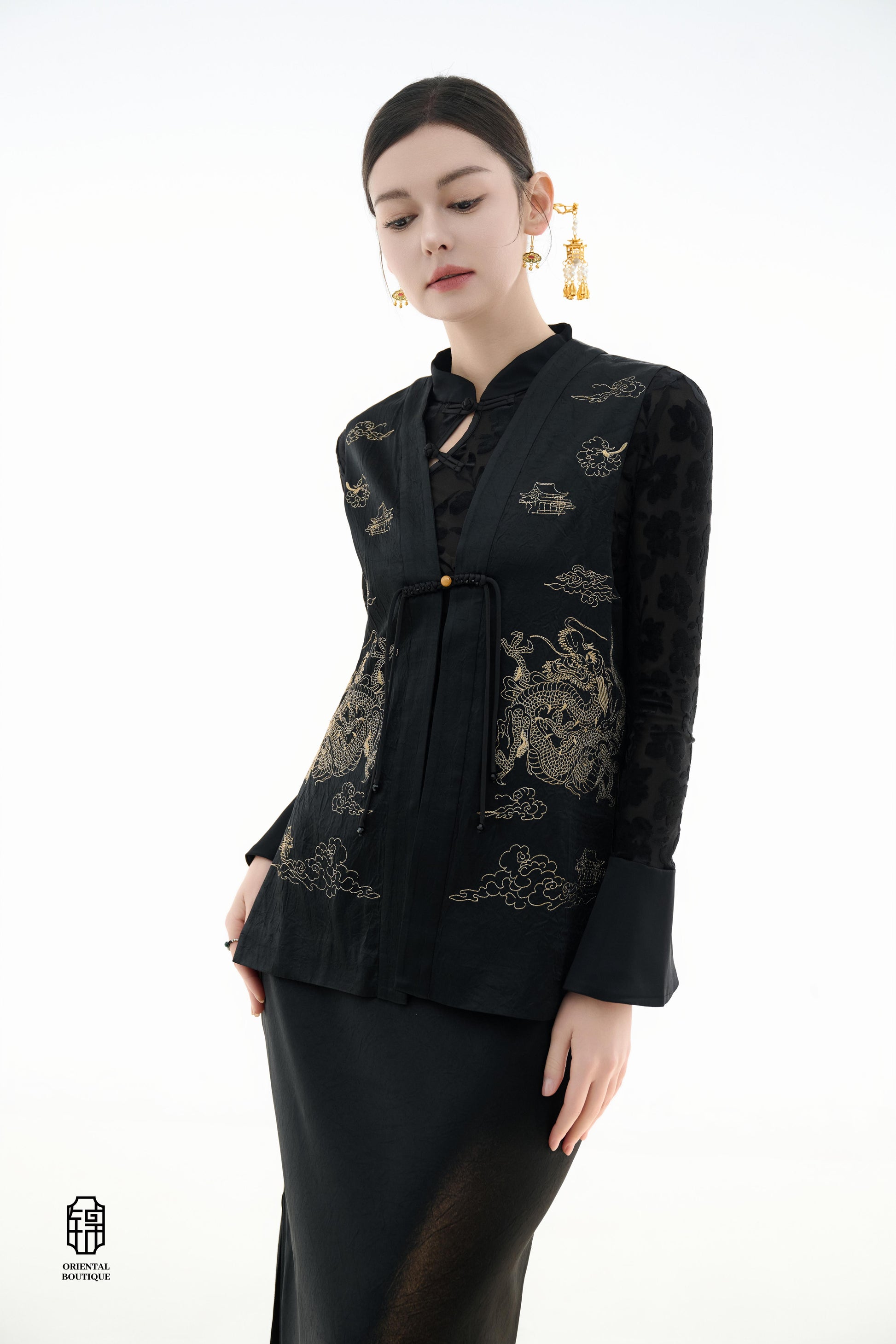 Dragon Soaring Brocade Vest,The Dragon Soaring Brocade Jacket features a deep black base with intricate golden dragon embroidery, exuding a dignified and regal aura. The front of the jacket is adorned with delicate gold thread patterns, depicting dragons,