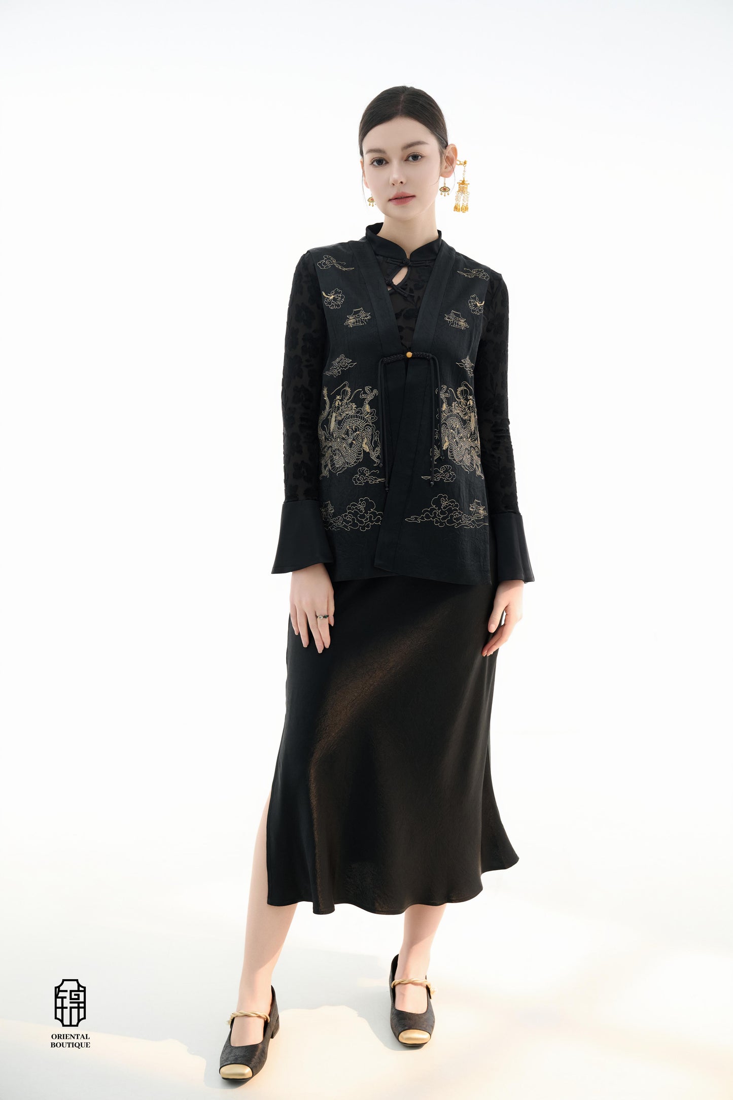 Dragon Soaring Brocade Vest,The Dragon Soaring Brocade Jacket features a deep black base with intricate golden dragon embroidery, exuding a dignified and regal aura. The front of the jacket is adorned with delicate gold thread patterns, depicting dragons,