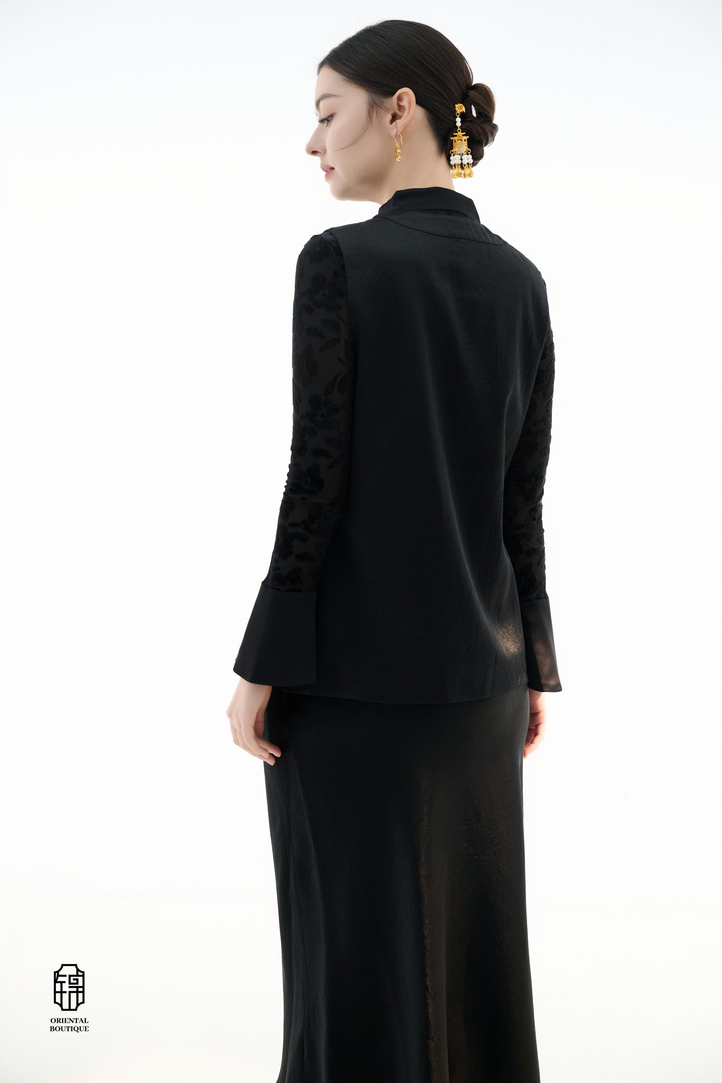 Dragon Soaring Brocade Vest,The Dragon Soaring Brocade Jacket features a deep black base with intricate golden dragon embroidery, exuding a dignified and regal aura. The front of the jacket is adorned with delicate gold thread patterns, depicting dragons,