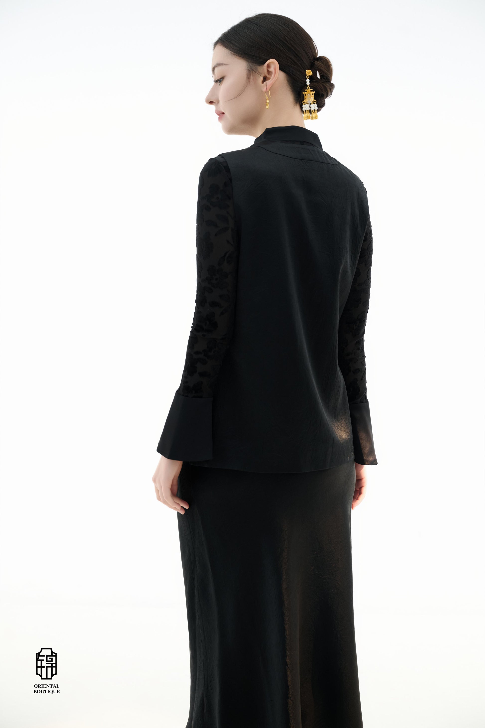Dragon Soaring Brocade Vest,The Dragon Soaring Brocade Jacket features a deep black base with intricate golden dragon embroidery, exuding a dignified and regal aura. The front of the jacket is adorned with delicate gold thread patterns, depicting dragons,