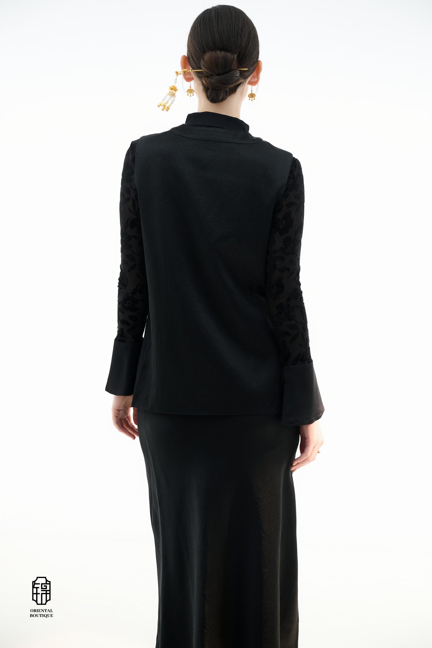 Dragon Soaring Brocade Vest,The Dragon Soaring Brocade Jacket features a deep black base with intricate golden dragon embroidery, exuding a dignified and regal aura. The front of the jacket is adorned with delicate gold thread patterns, depicting dragons,
