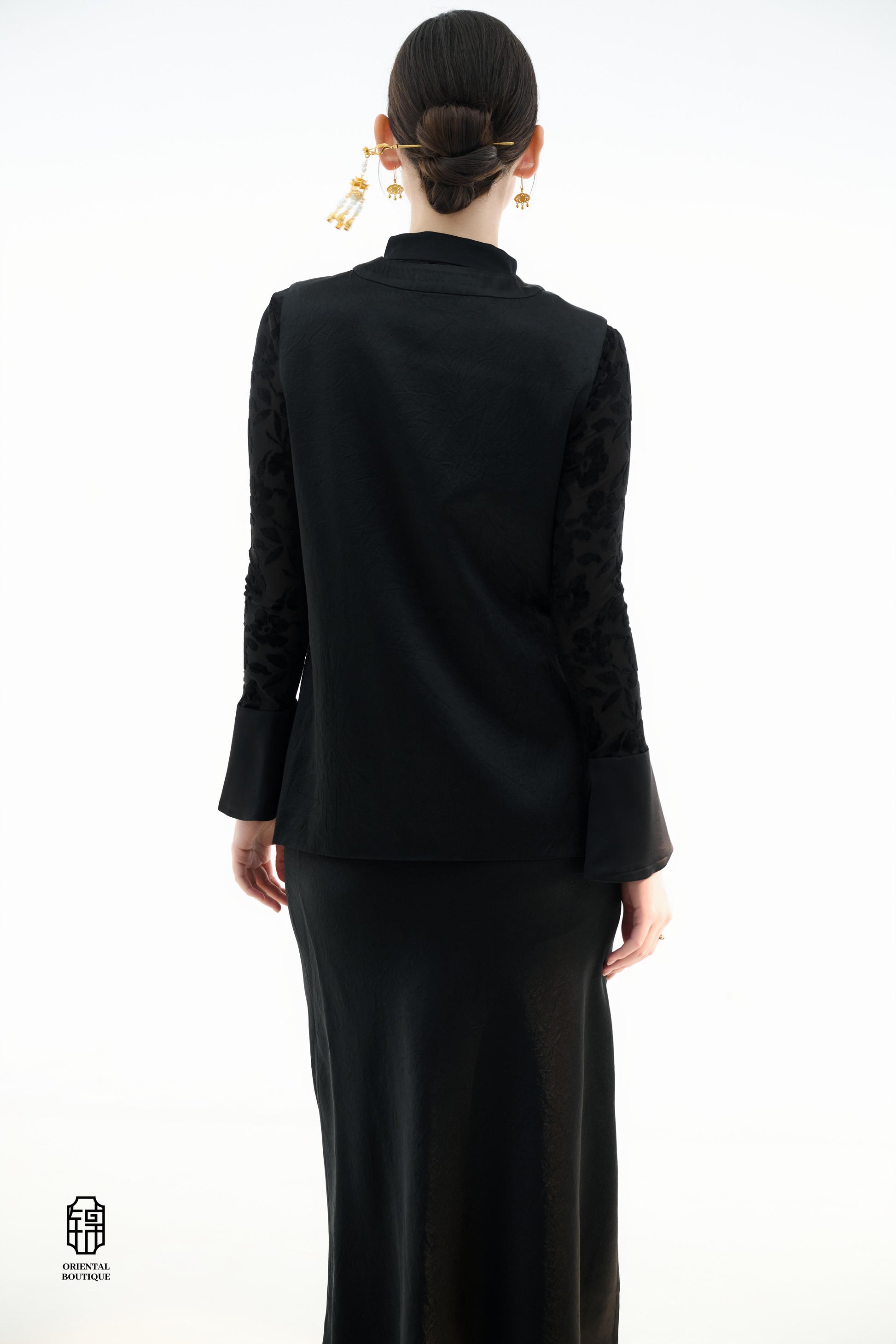 Dragon Soaring Brocade Vest,The Dragon Soaring Brocade Jacket features a deep black base with intricate golden dragon embroidery, exuding a dignified and regal aura. The front of the jacket is adorned with delicate gold thread patterns, depicting dragons,