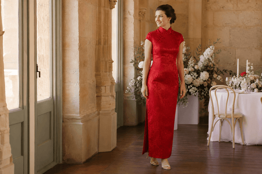 Non-Chinese bride wearing a modern red wedding qipao at an Australian reception