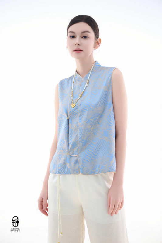 Blue Ocean Cloud Sleeveless Top,The Blue Ocean Cloud Sleeveless Top is crafted from a delicate light blue silk fabric, featuring intricate patterns of clouds and ocean waves, embodying the elegance and unique aesthetics of Eastern design. The sleeveless c