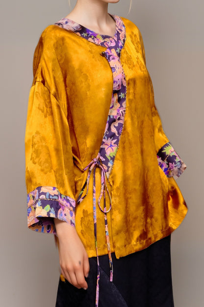 Artistic Jacquard Rayon Wrap Blouse – Golden Floral Pattern with Contrast Trim | New Chinese Style