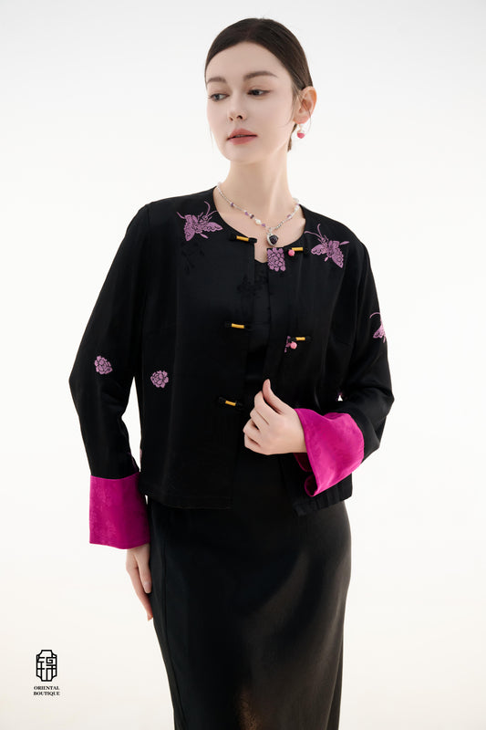 Purple Butterfly Grace Jacket,The Purple Butterfly Grace Jacket is a black outerwear piece that blends classical and modern aesthetics. Adorned with delicate purple butterfly and floral embroidery, it symbolizes elegance and romance. The unique button des