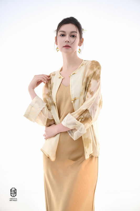 Golden Mist Silk Jacket,Jacket: The Golden Mist Silk Jacket features a soft, golden hue with lightweight, breathable fabric and a gradient pattern resembling the beauty of morning mist. The jacket is designed with a loose fit, providing comfort and freedo